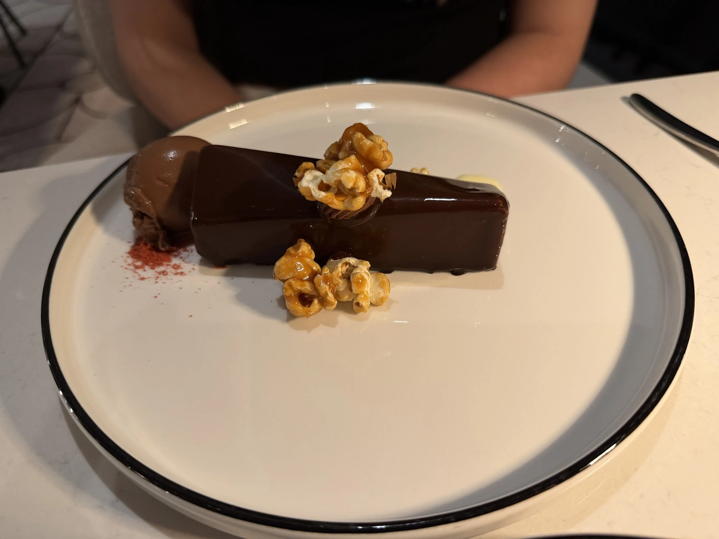Valrhona Dark Chocolate Mousse Cake, served at Palomar onboard Norwegian Luna, © Fraser at Sea
