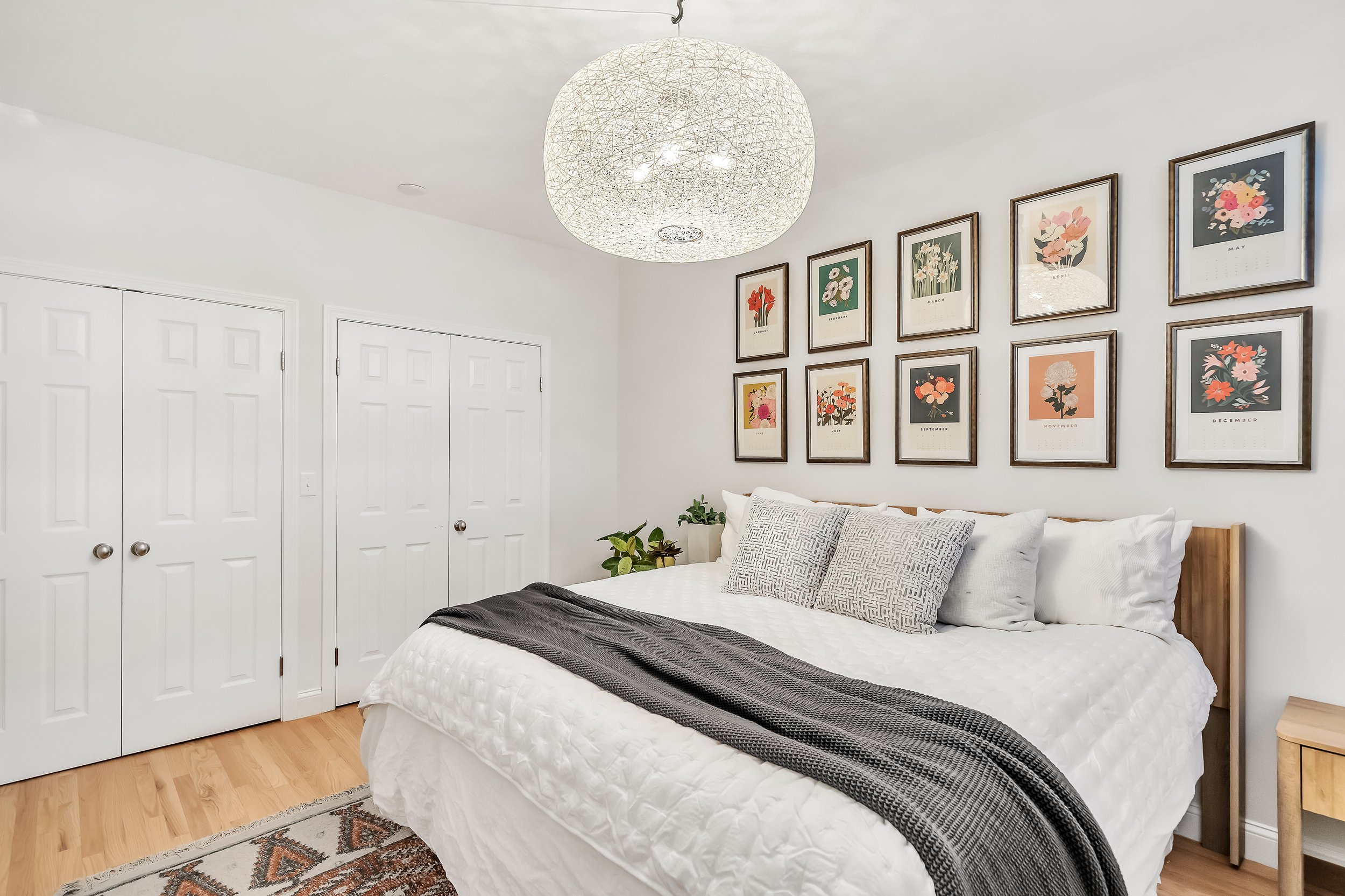 Refinished hardwood, painted, and replaced light fixtures throughout the unit. Reconfigured and built-out closets.