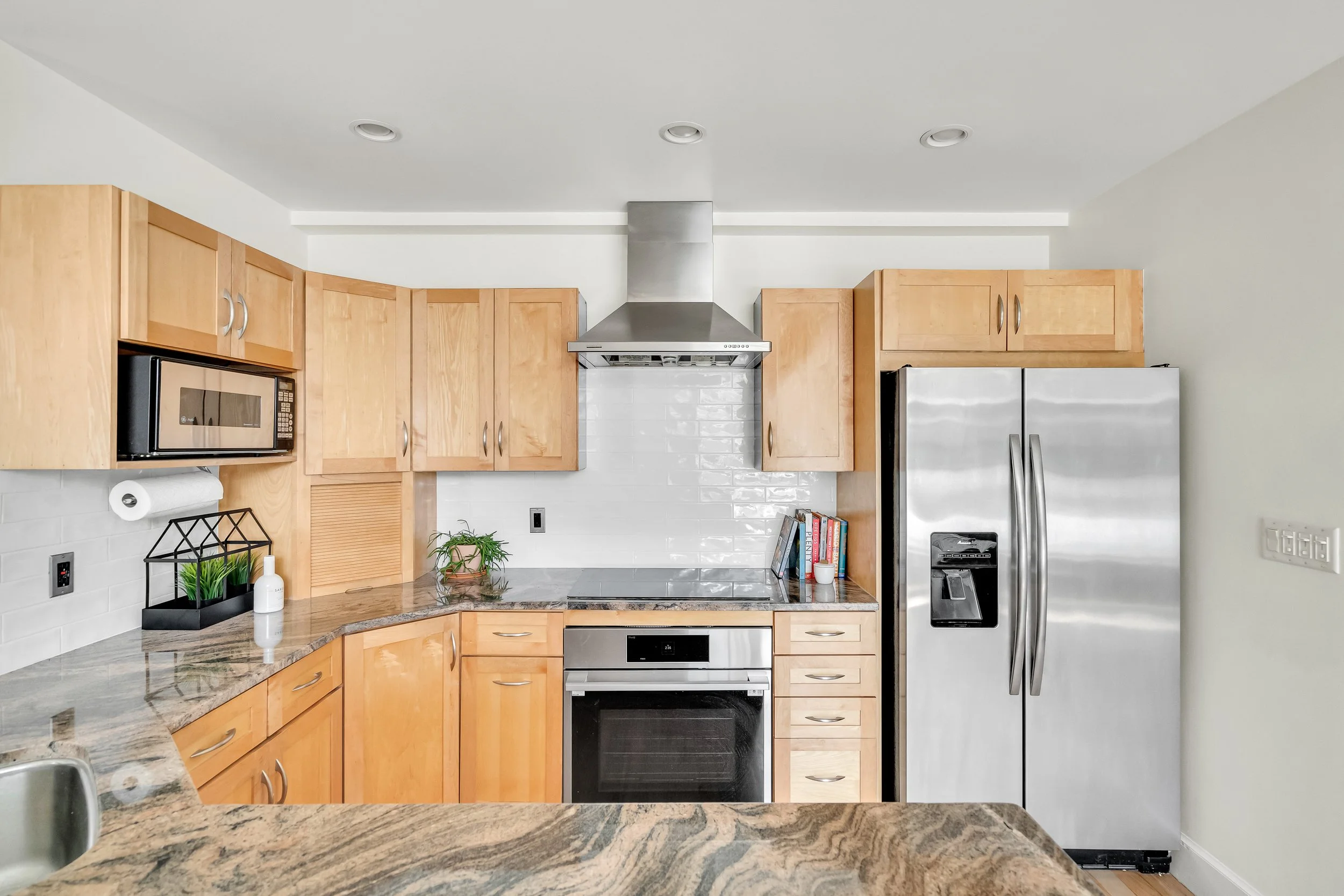 Changed out backsplash to a white subway tile.
