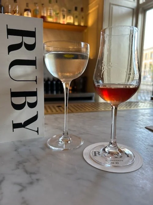 Cocktails at Ruby Bar in Copenhagen, a stylish speakeasy known for creative drinks and a cozy atmosphere