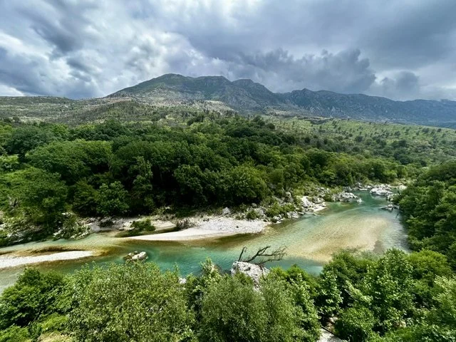 Turquoise spring-fed waters at Uji i Ftohtë in southern Albania