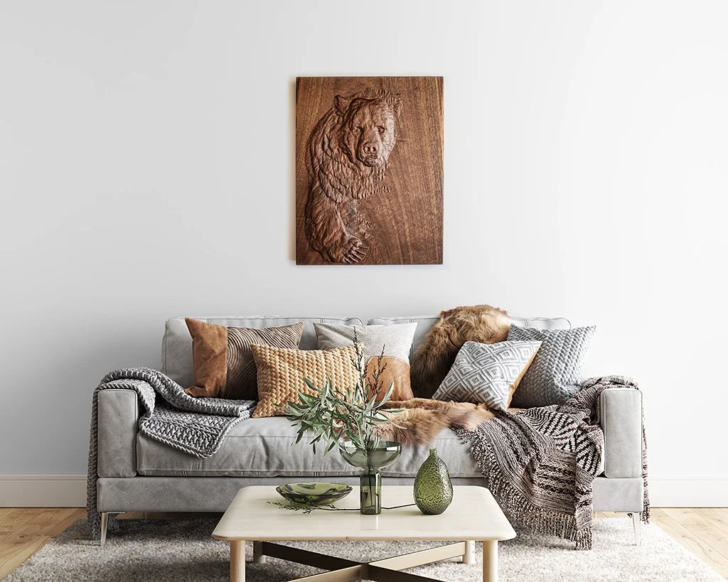 Walnut wood wall art with a 3D carved bear design.