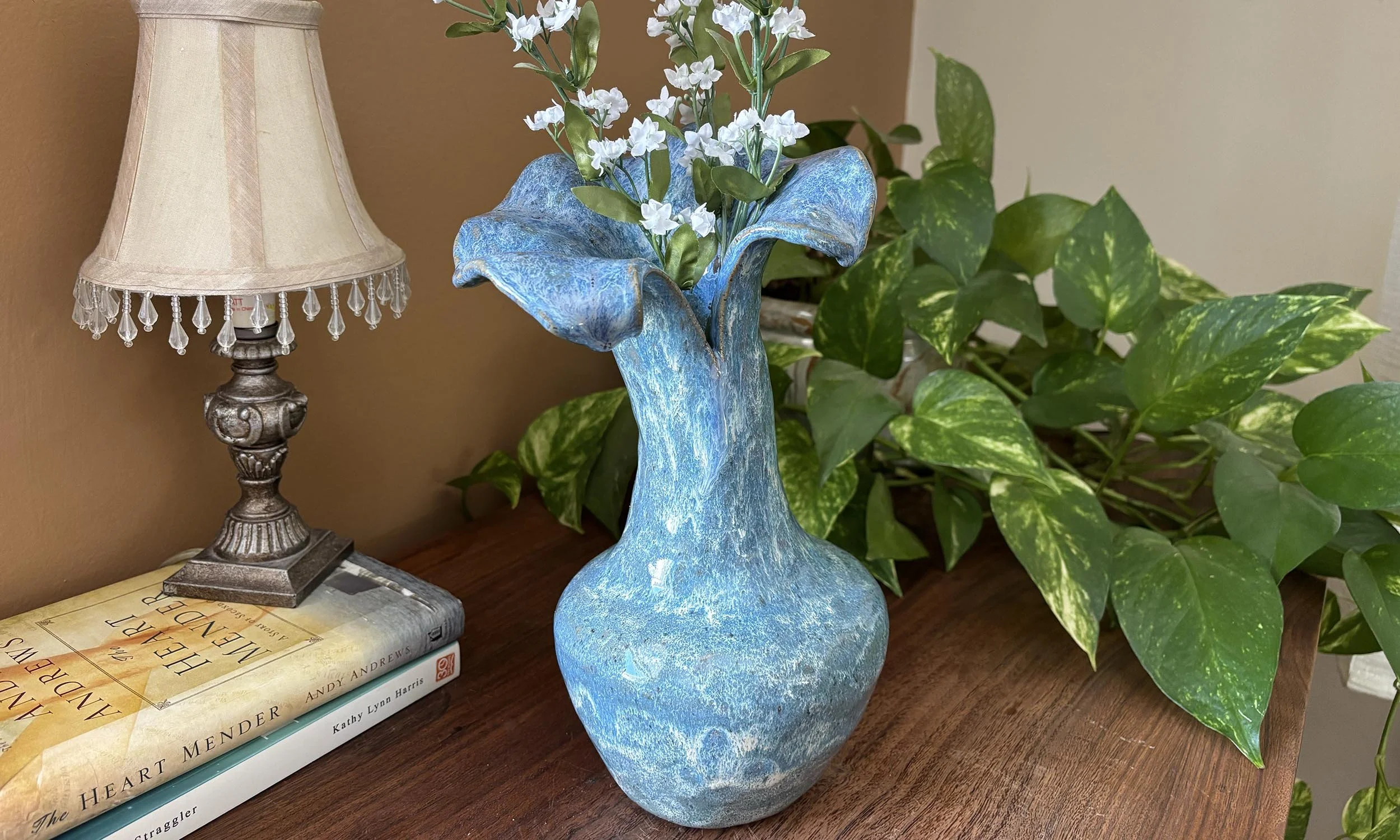 Slanted blue vase, 6.625" x 11" x 5"