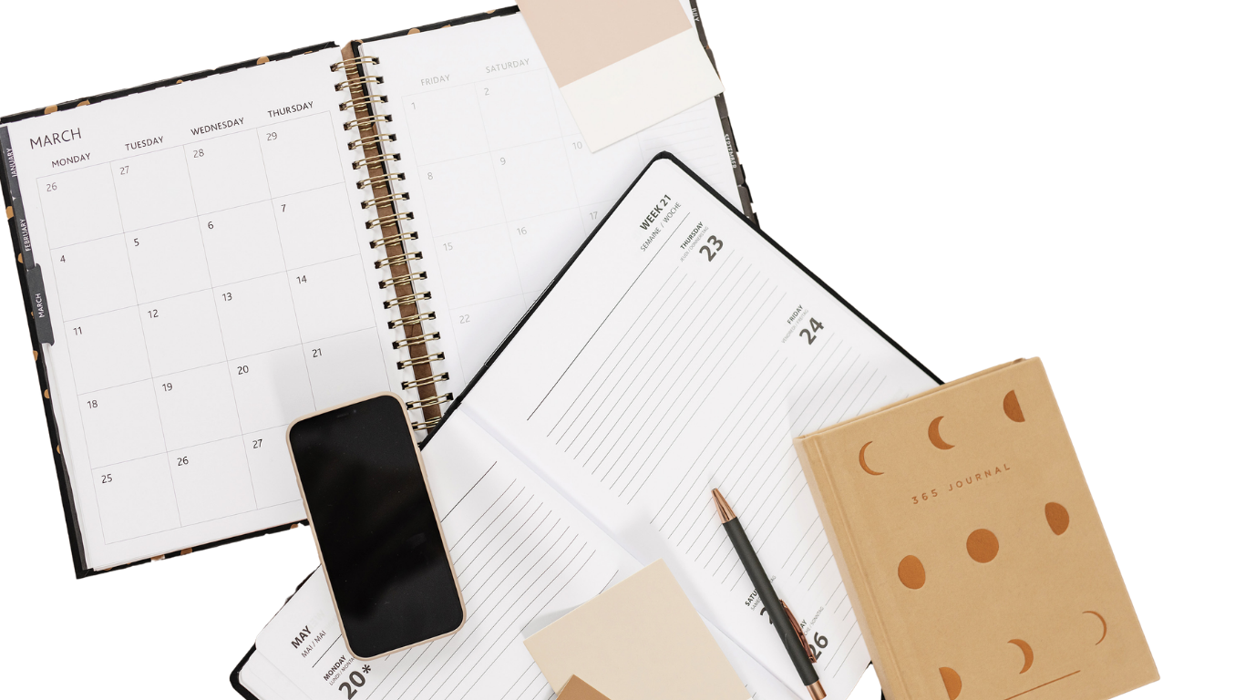 Photo of 2 planners and 365 day journal