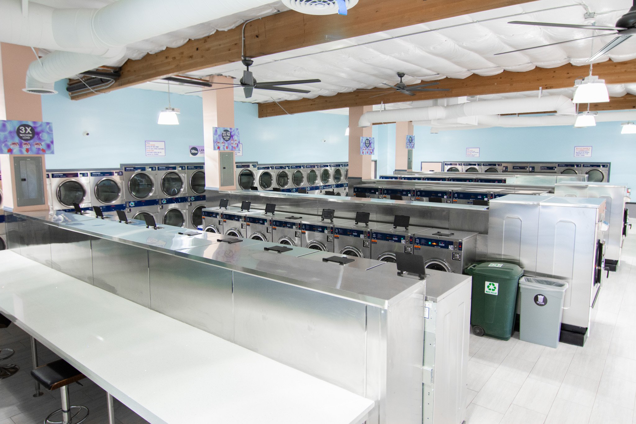 Say goodbye to crowded, stuffy waits! There's no shortage of space in our laundromat.