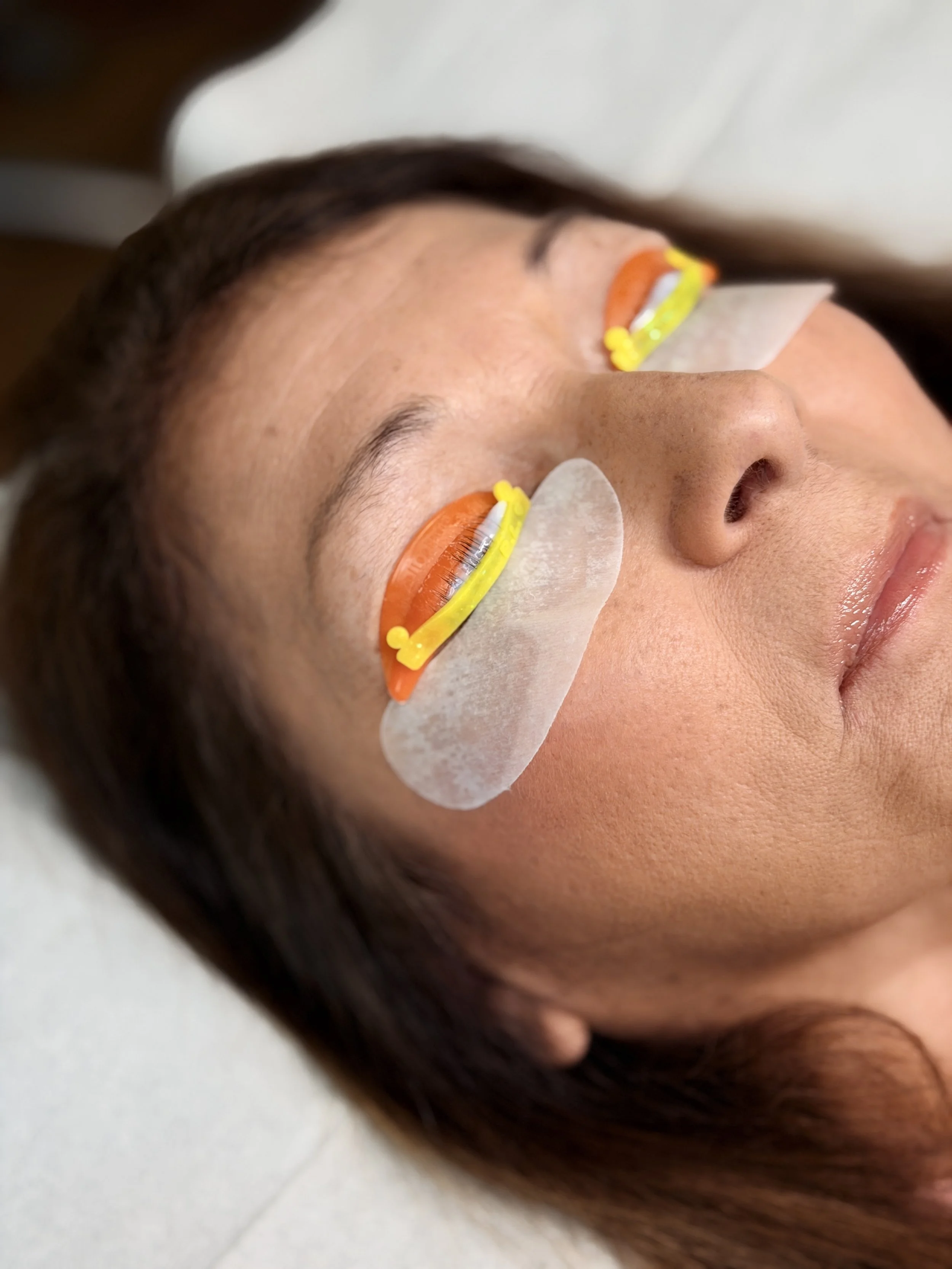 Graduates completing professional lash lift and tint course