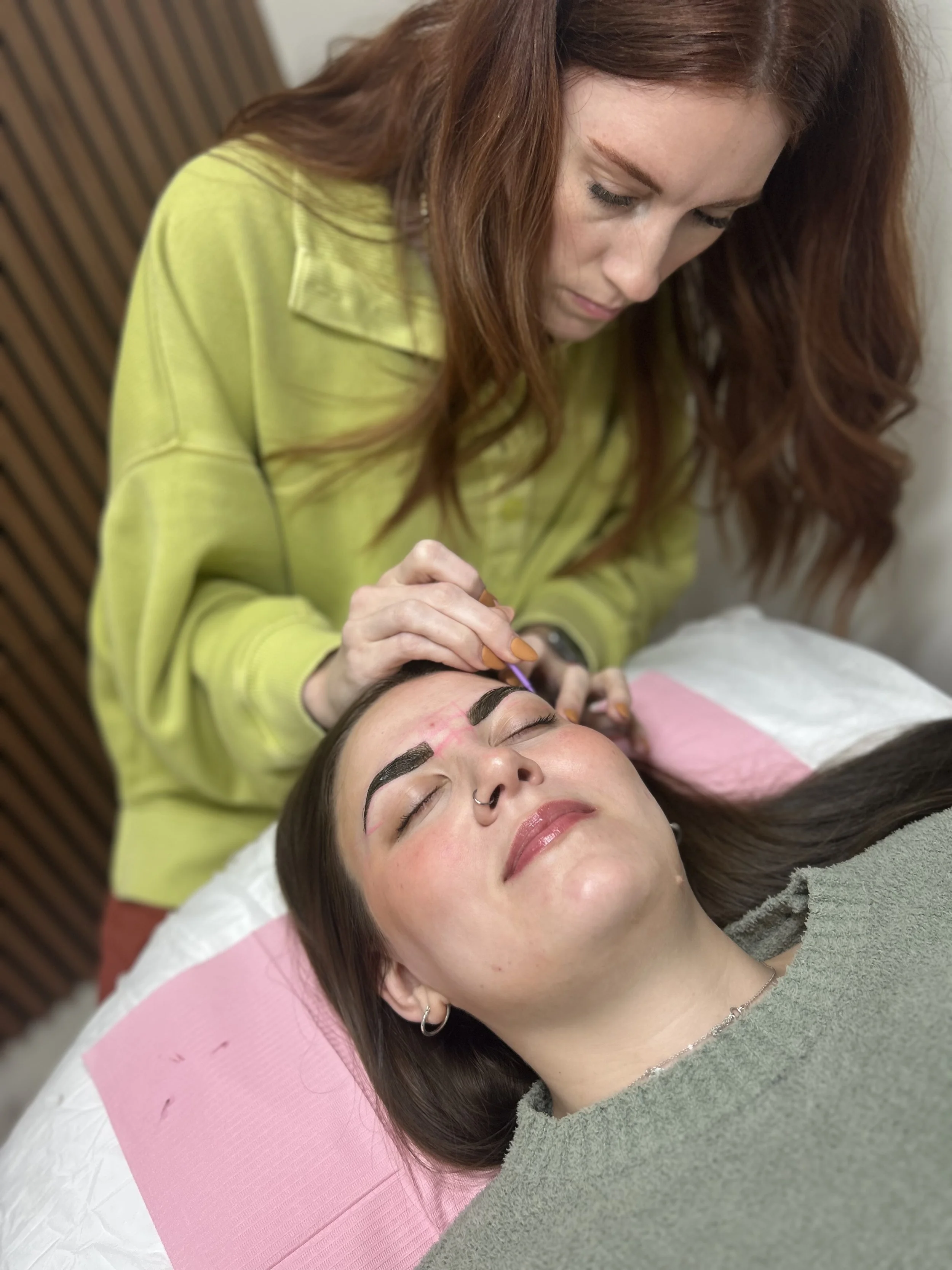 Beauty instructor leading Noemi brow certification masterclass