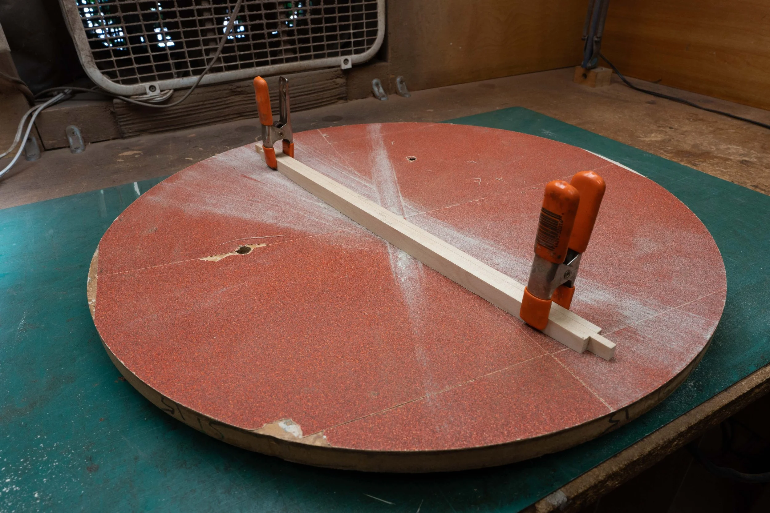 A radius is sanded onto the braces to match the radius of the back. 