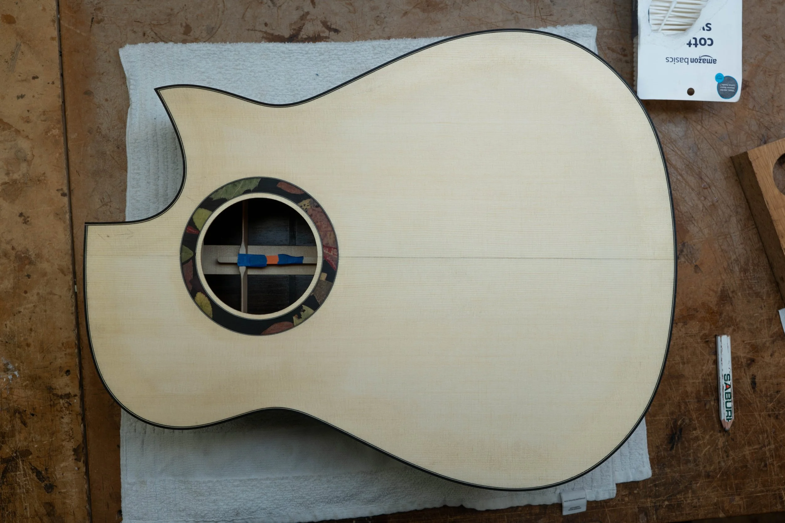 Silverman guitar modified dreadnought body.