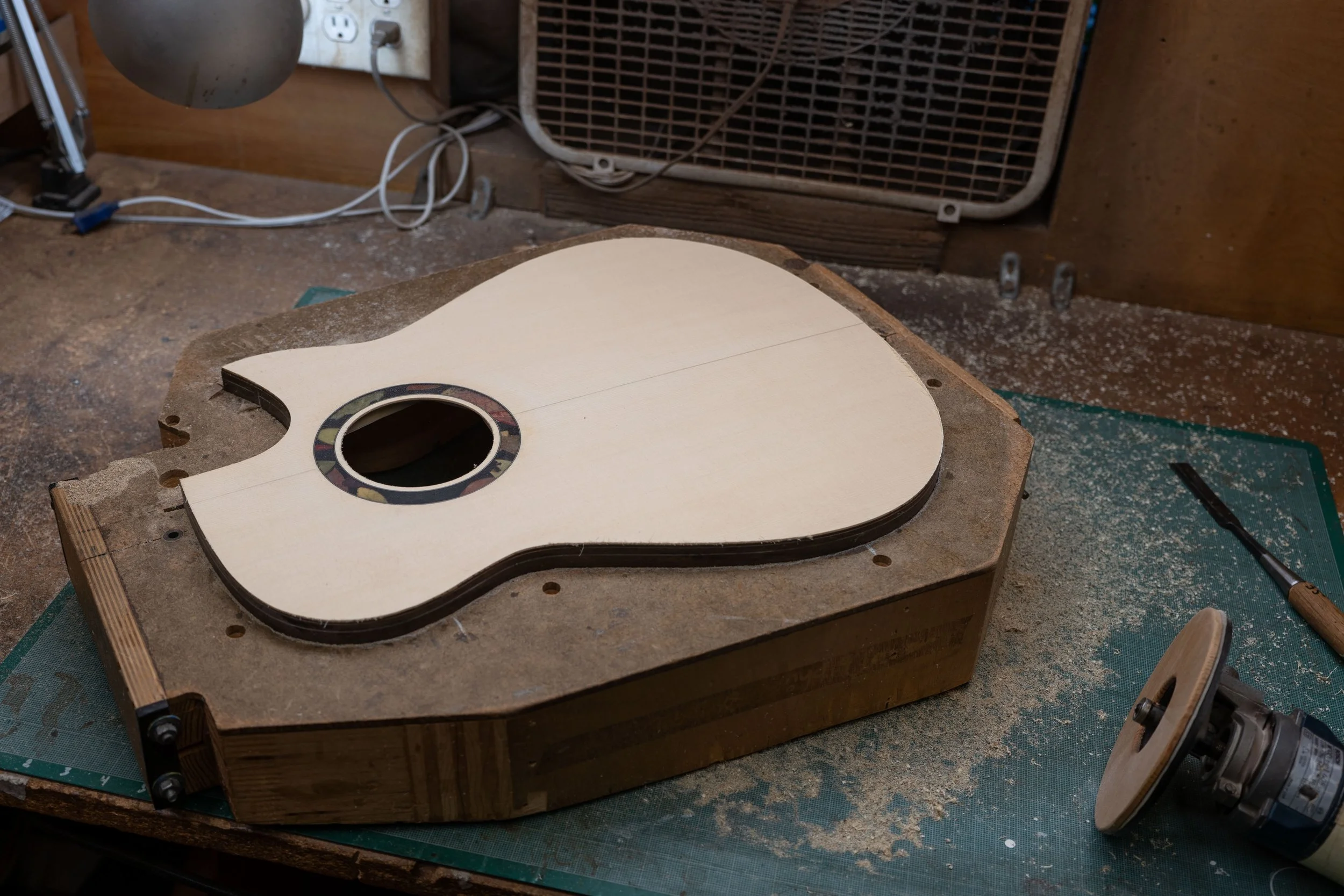 Silverman guitar trimming the top flush