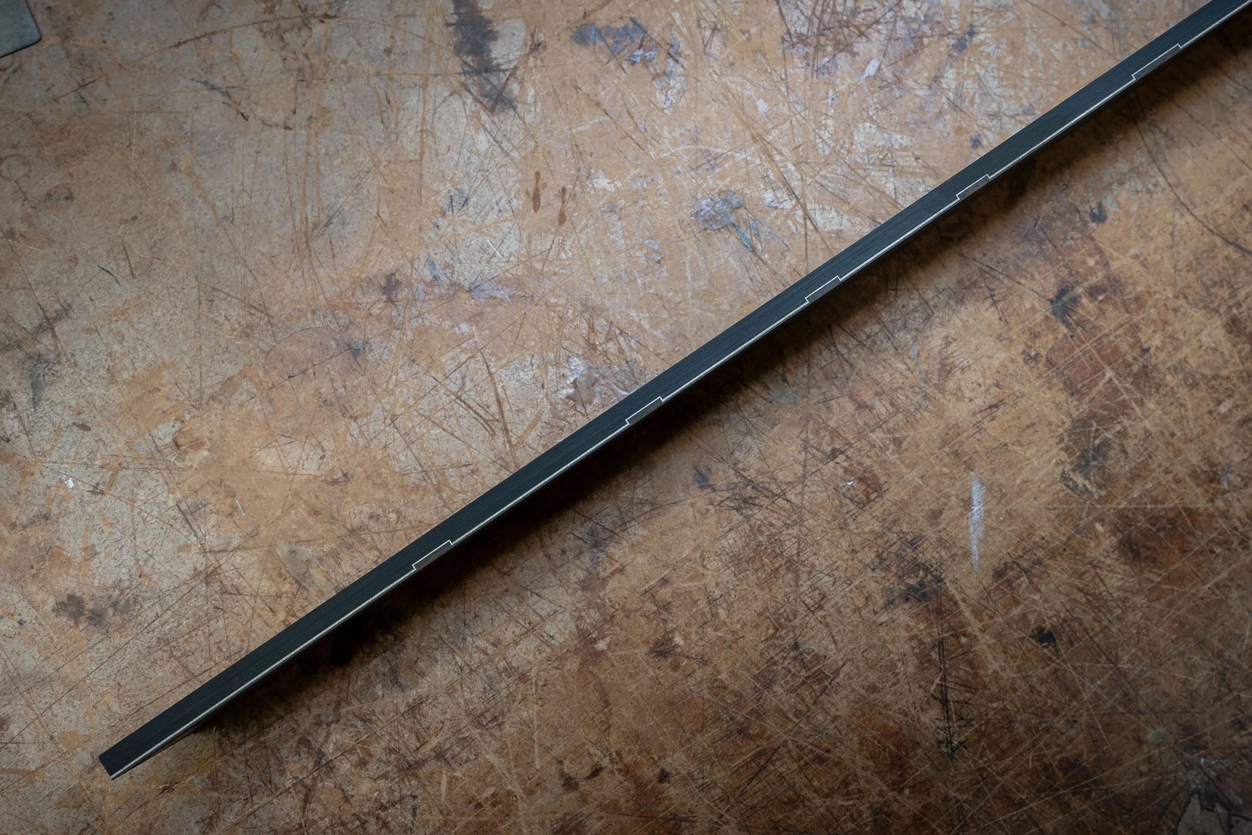 Silverman fretboard side markers with purfling.