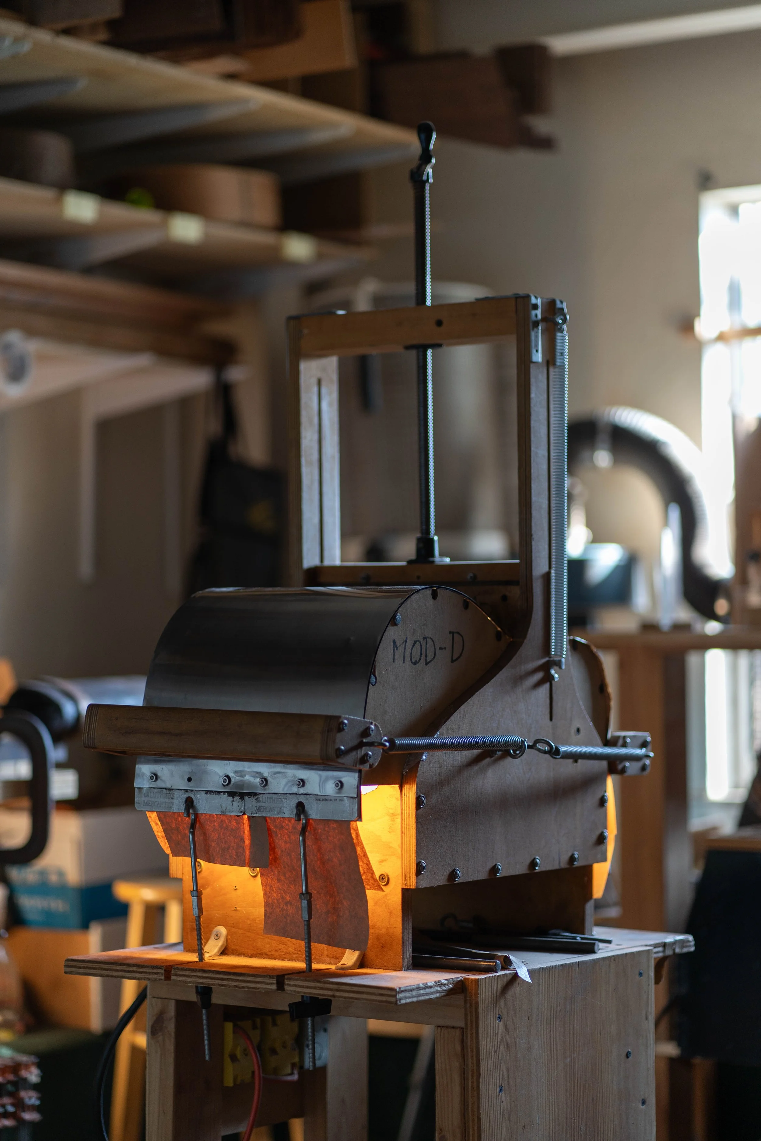 The sides in Ervin's bending jig. They need to be bent by hand first so they can fit in the jig.