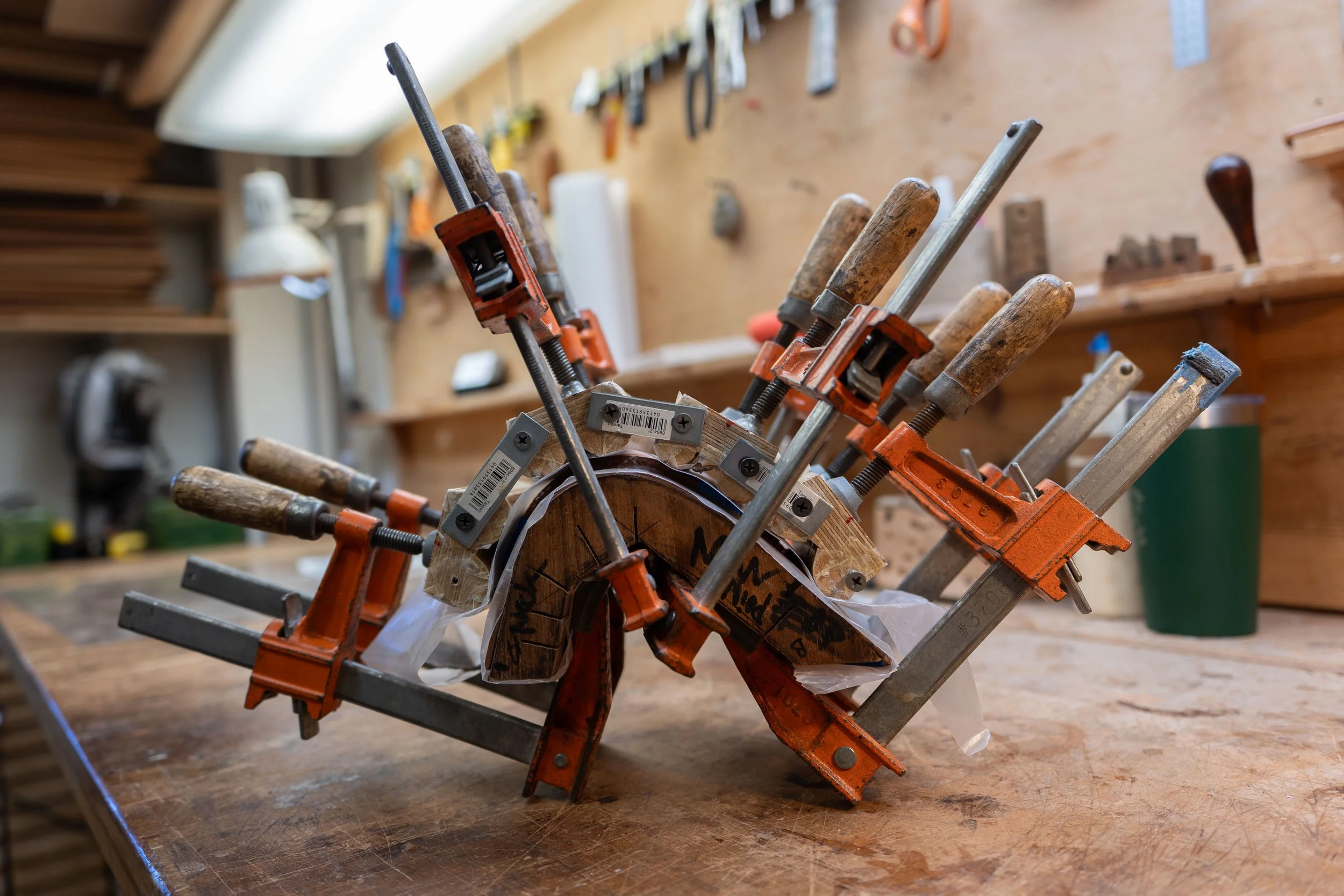 Laminating the wood for the cutaway lining.