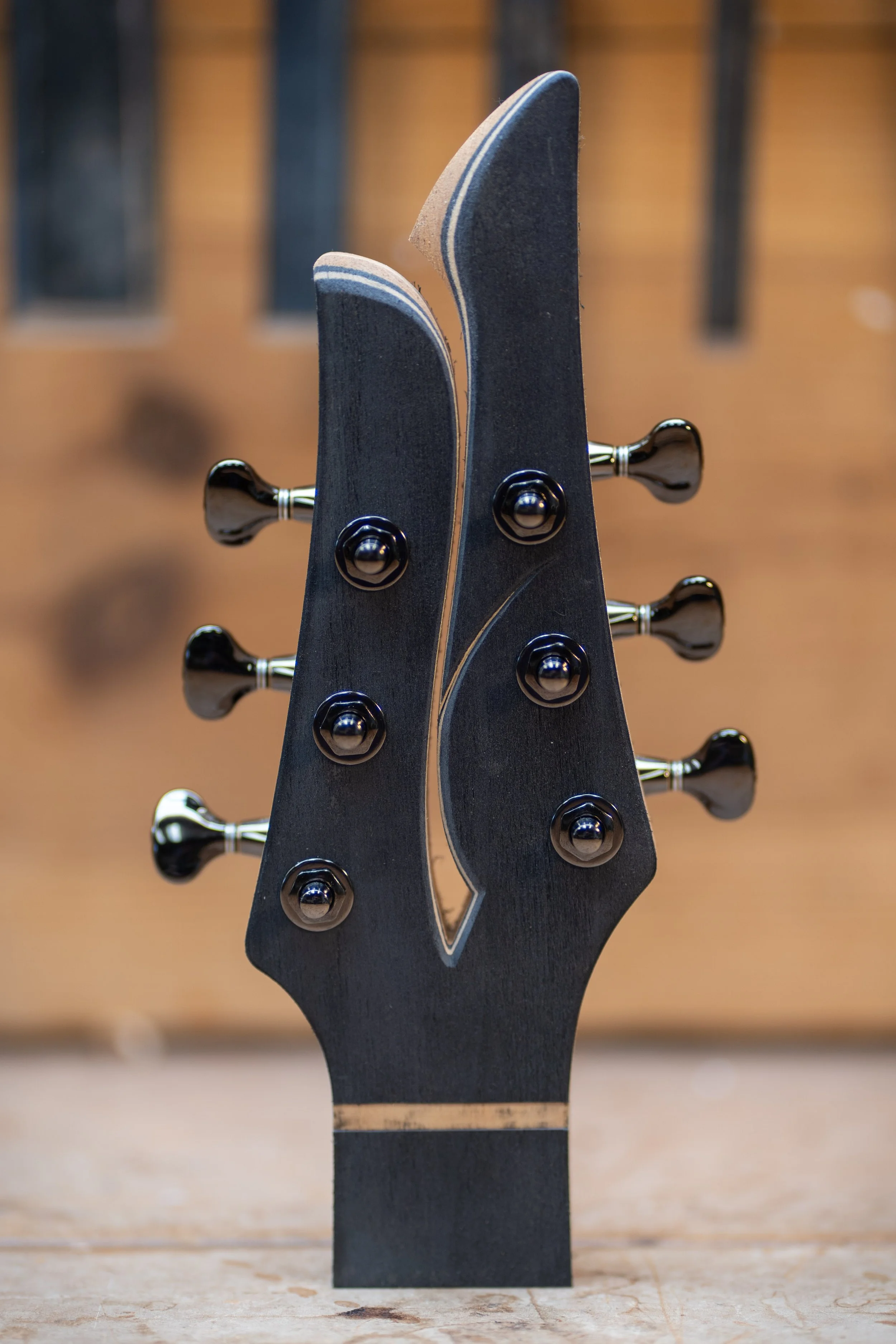 New headstock design prototype. Inspired by the split headstock designs of Michi Matsuda. 