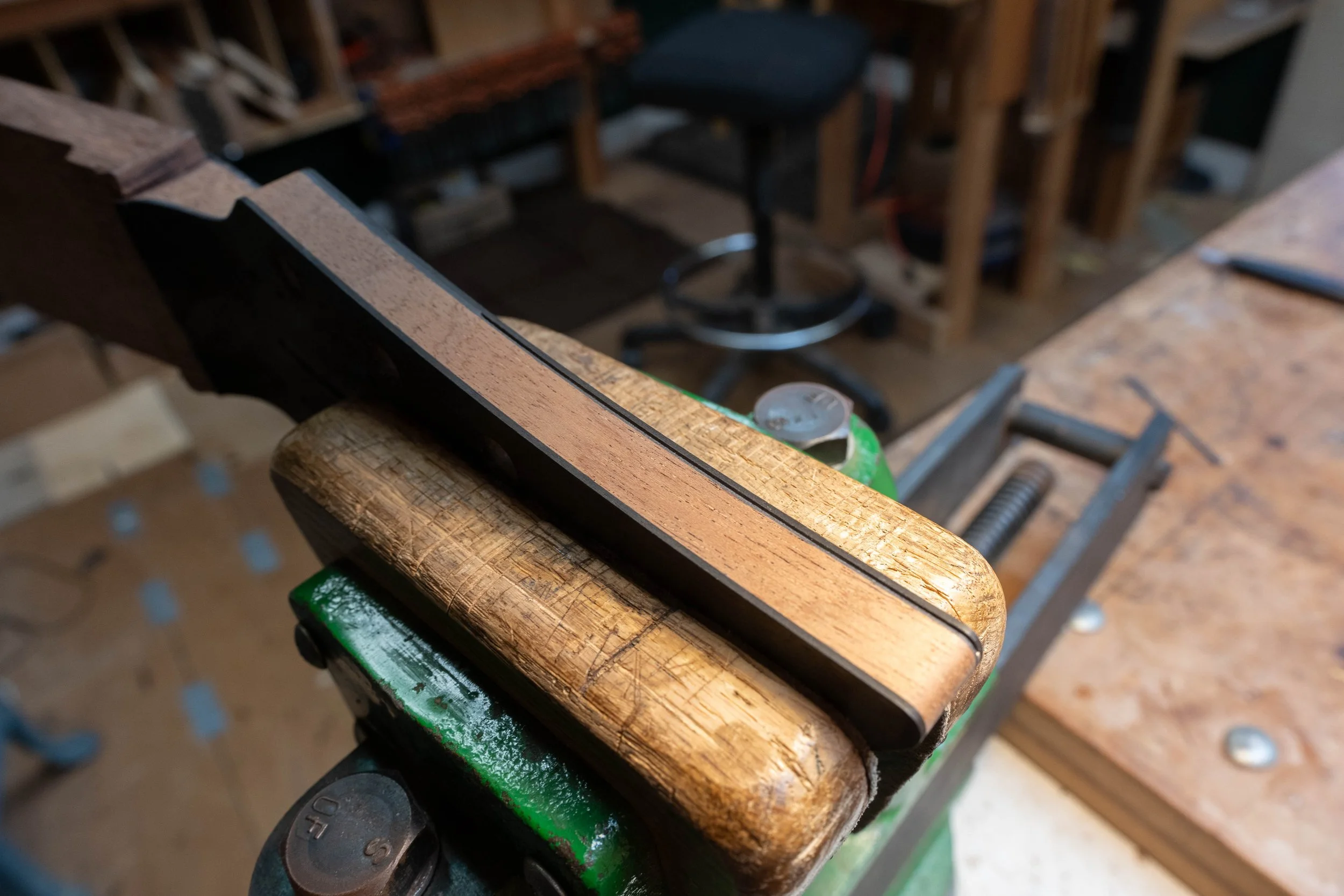 I chiselled out the white veneer from the sides.