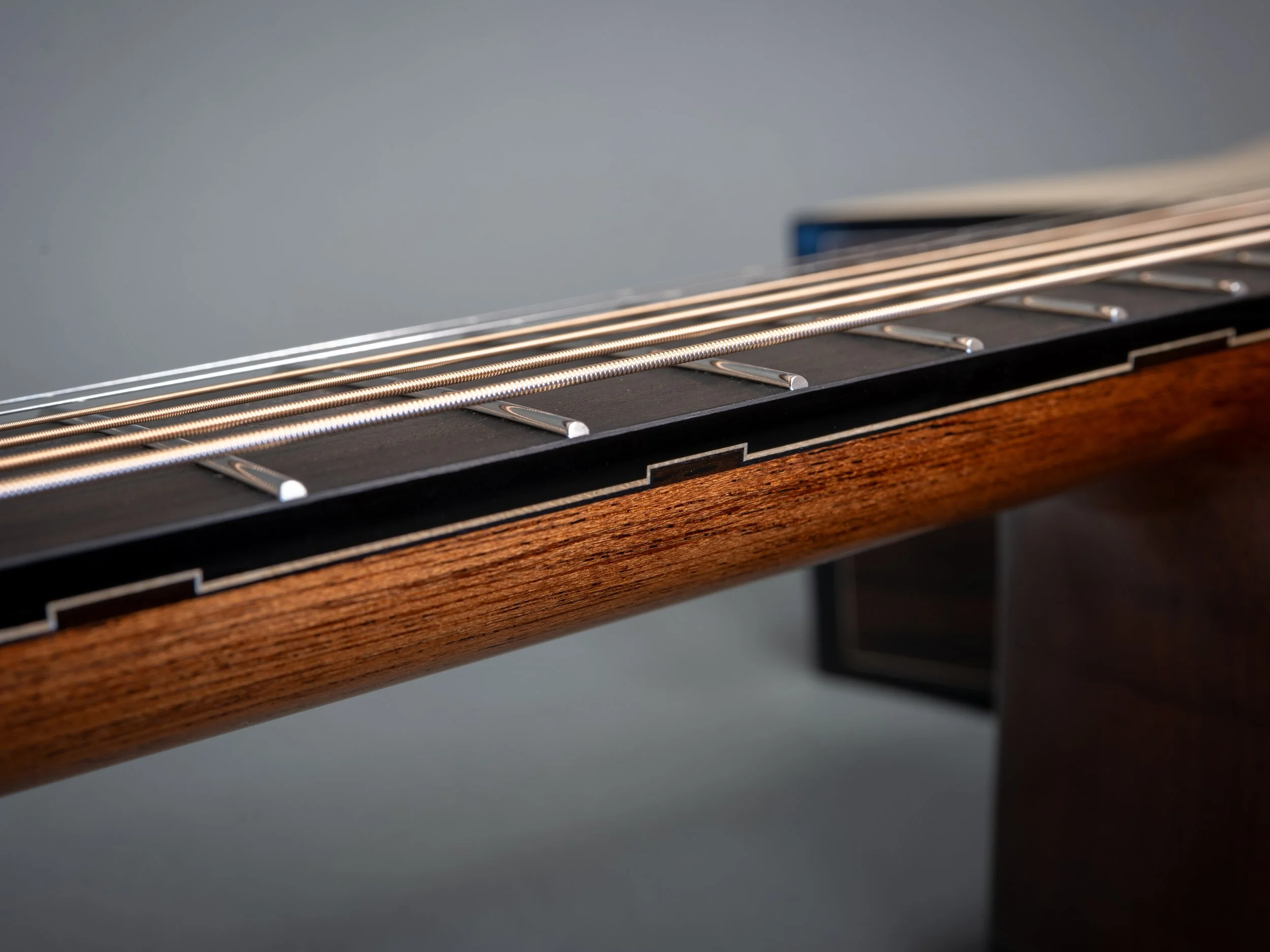Block inlay side markers with fretboard purfling
