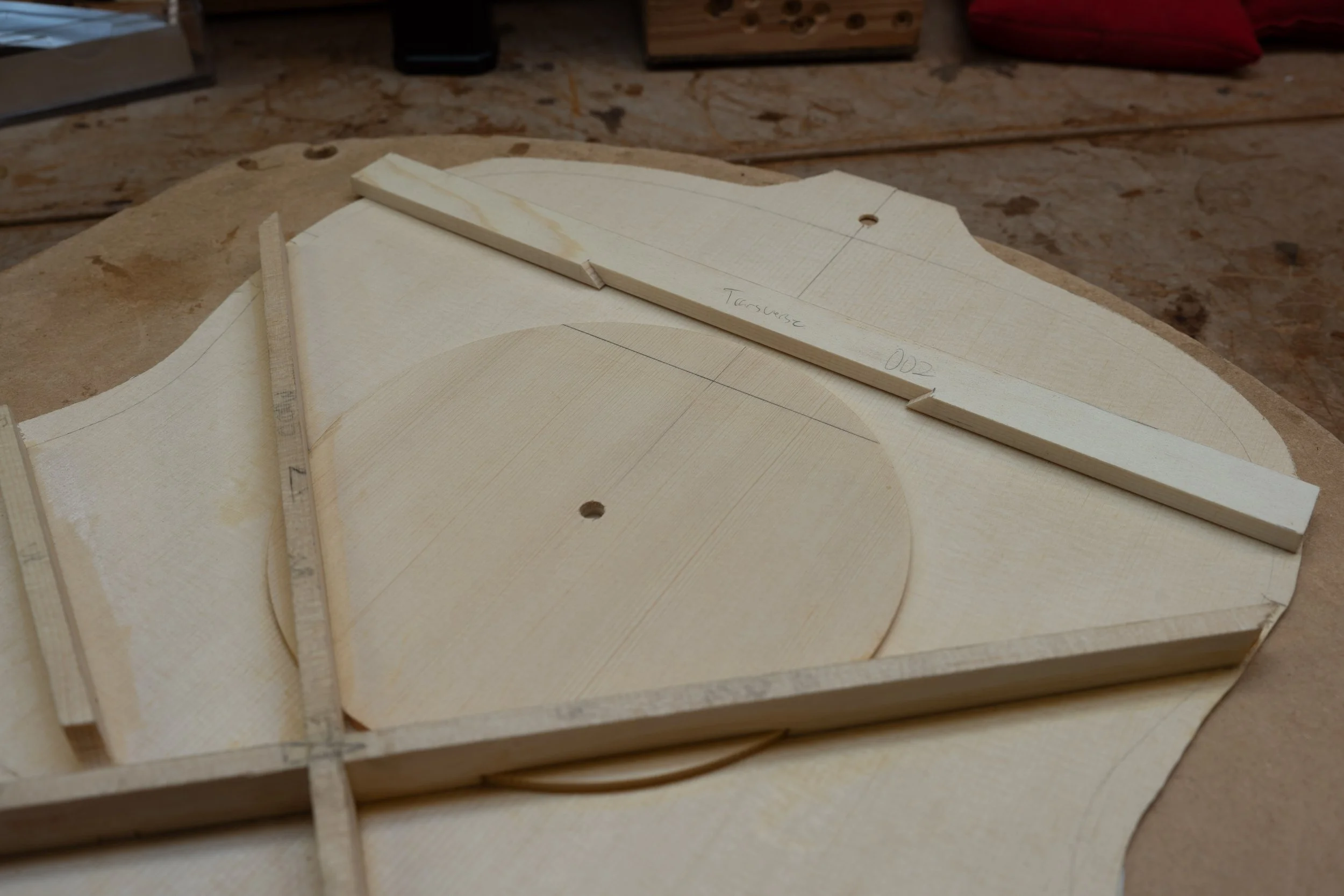 Since the donut was already in place, I notched the X and transverse braces over it. 