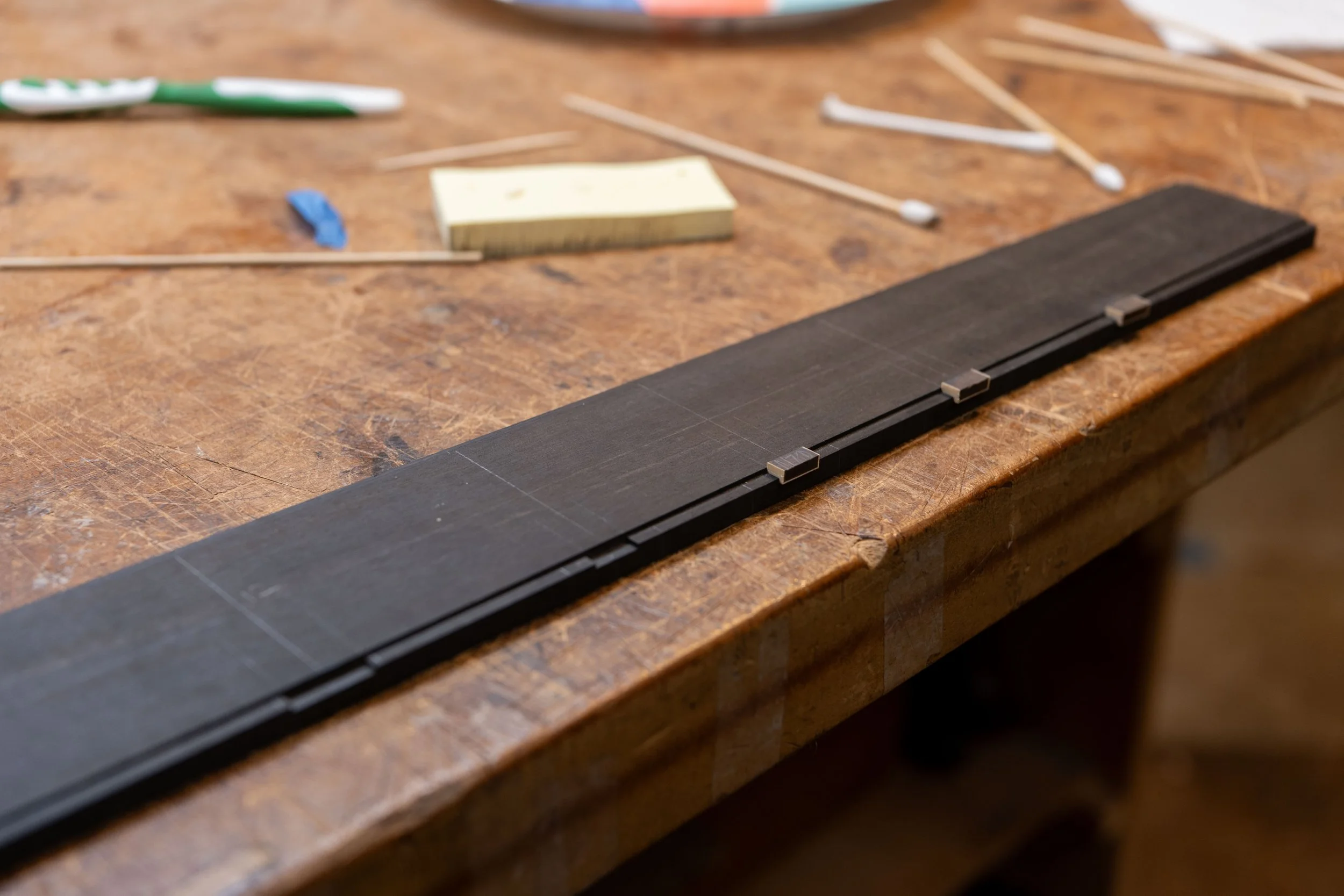 And glued slices from the rectangle with purfling.  