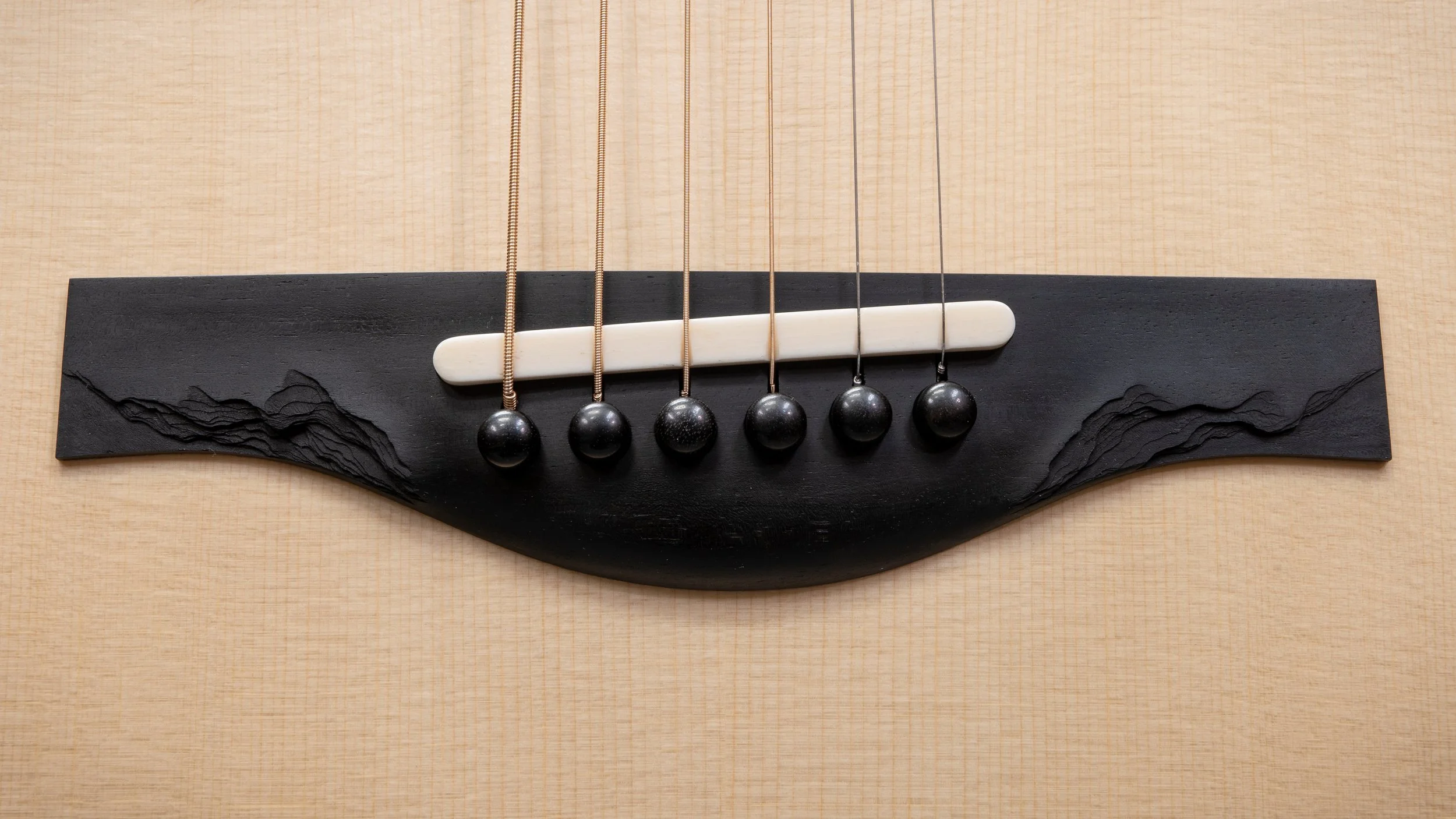 Rock slate texture carved guitar bridge