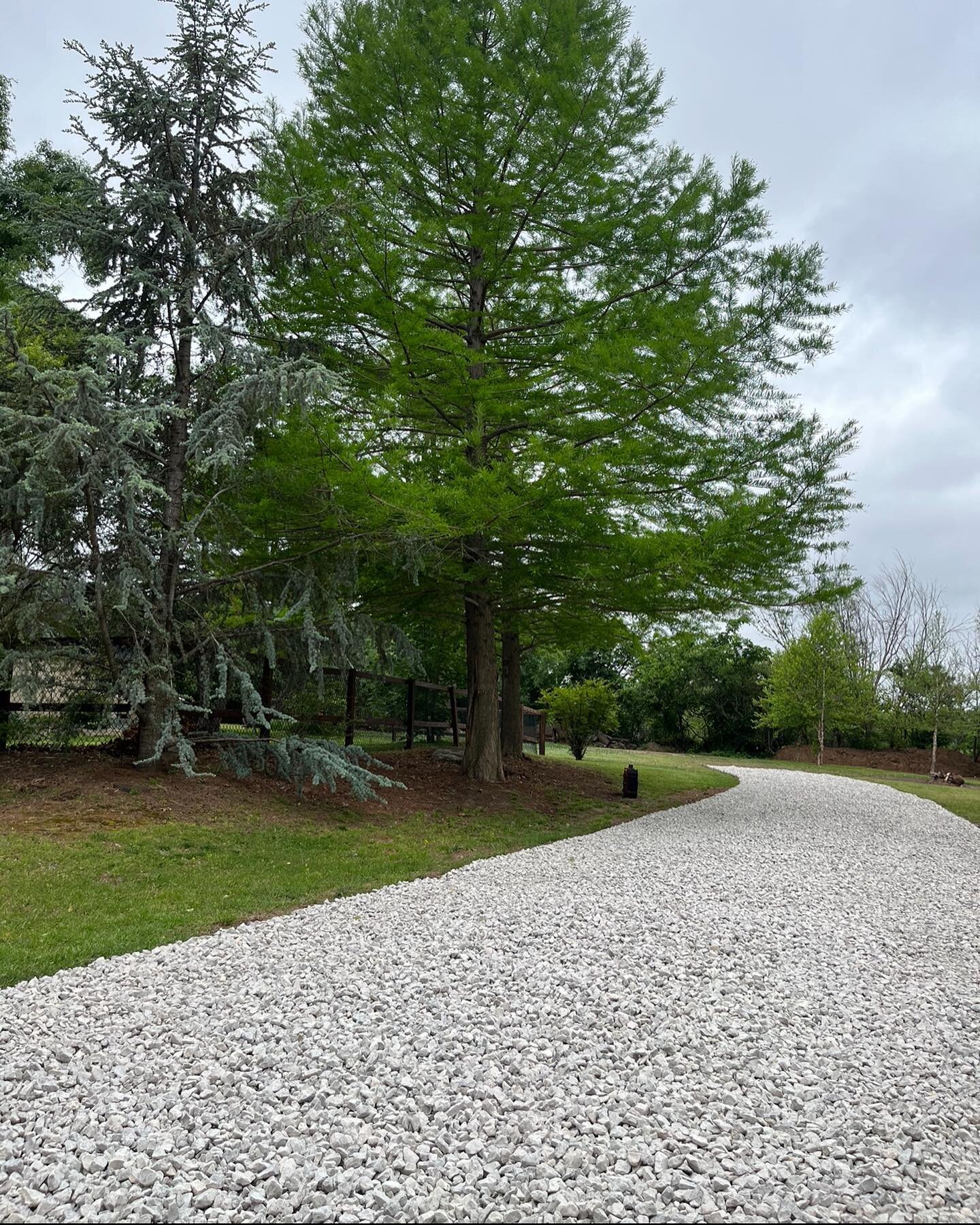 ⚠️NEW DRIVEWAY⚠️ For this client we created a beautiful gravel driveway that will no longer be an eye sore that holds water! #landscapingokc #okclandscaping #okcconstruction