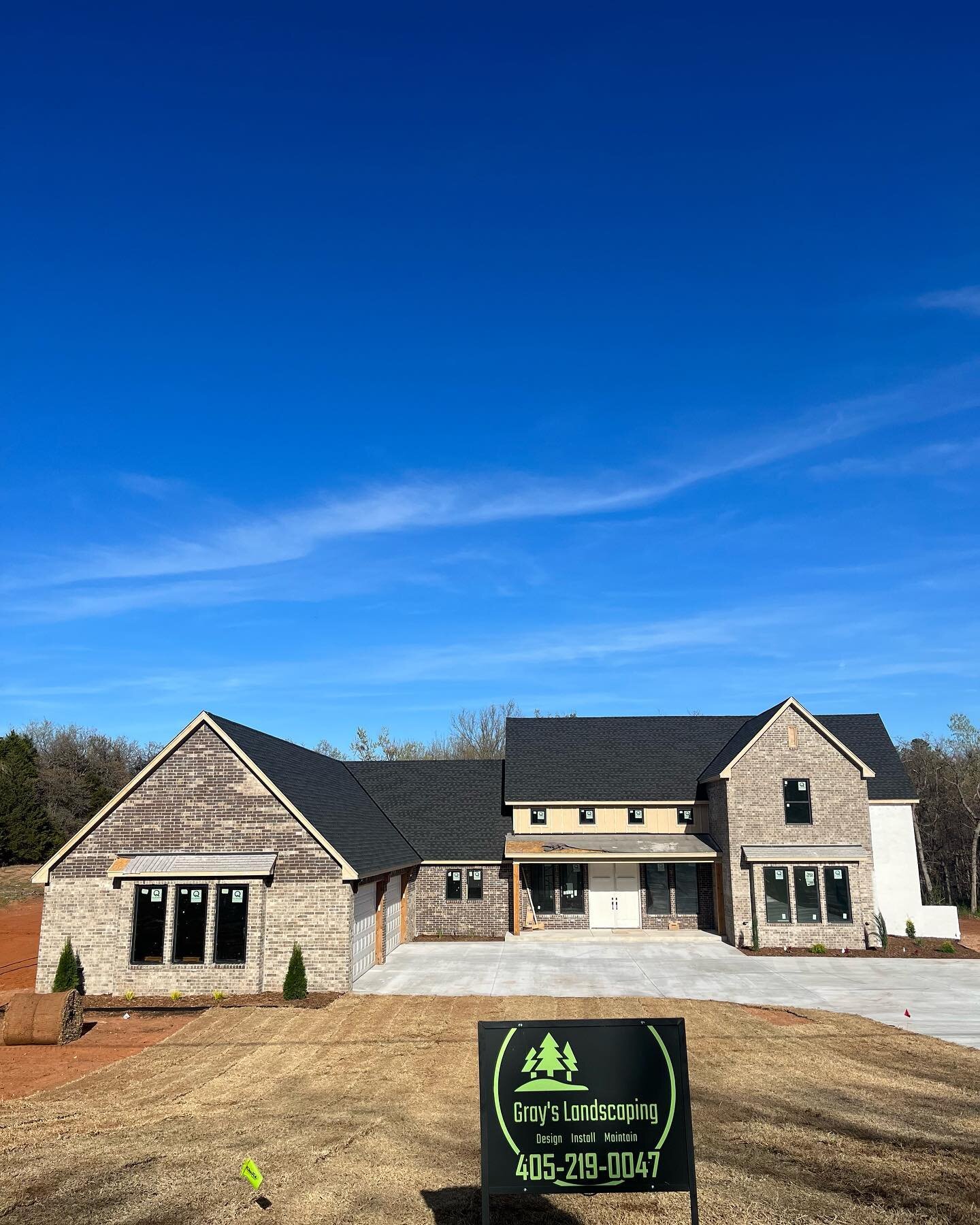 Stay tuned for the rest of this sod install at this beautiful new home! #landscapingokc #landscapedesign