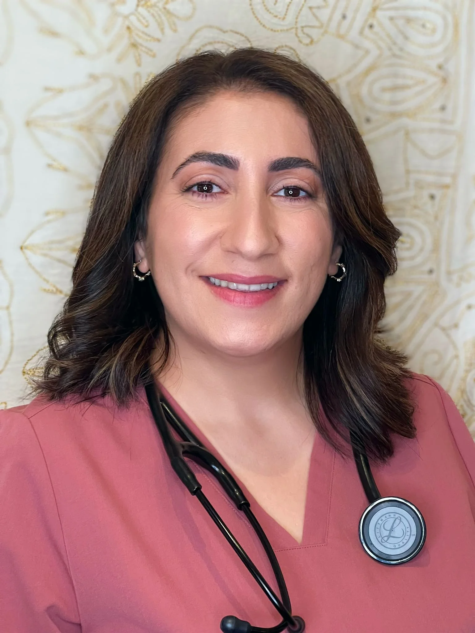 Dr. Liqaa Essam Naser, ND, naturopathic doctor specializing in thyroid disease, bioidentical hormone replacement therapy, PCOS, perimenopause, menopause, and metabolic health, serving Washington and California via telehealth and in-person care.