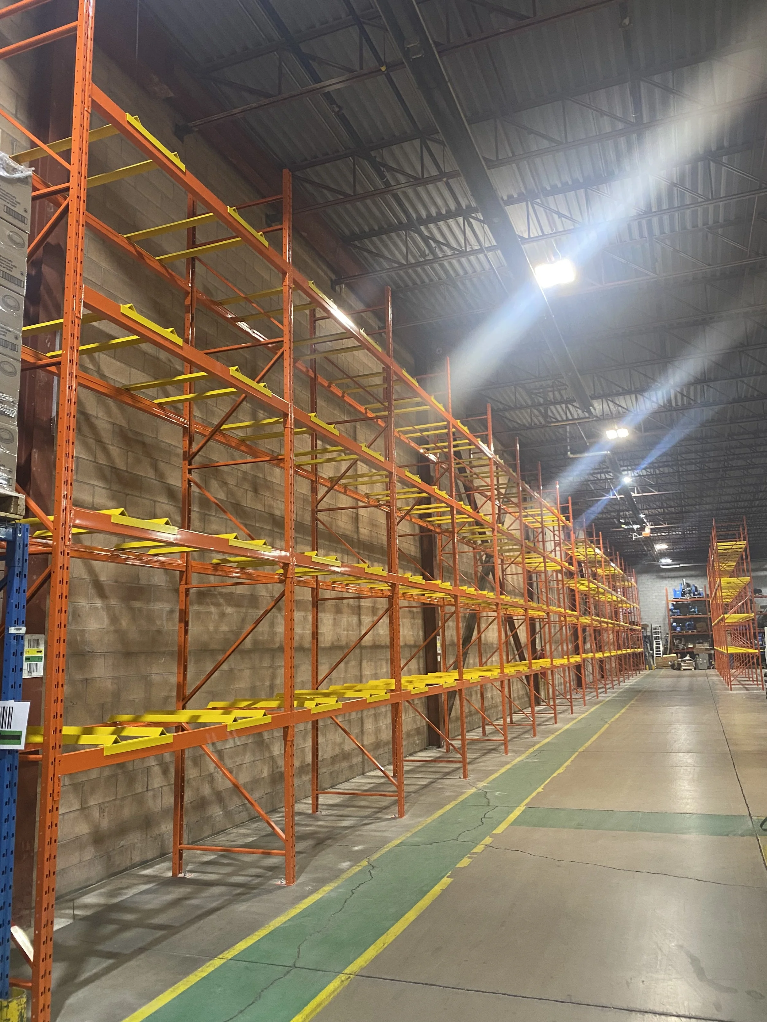 Custom pallet racking storage solution with drum cradles 