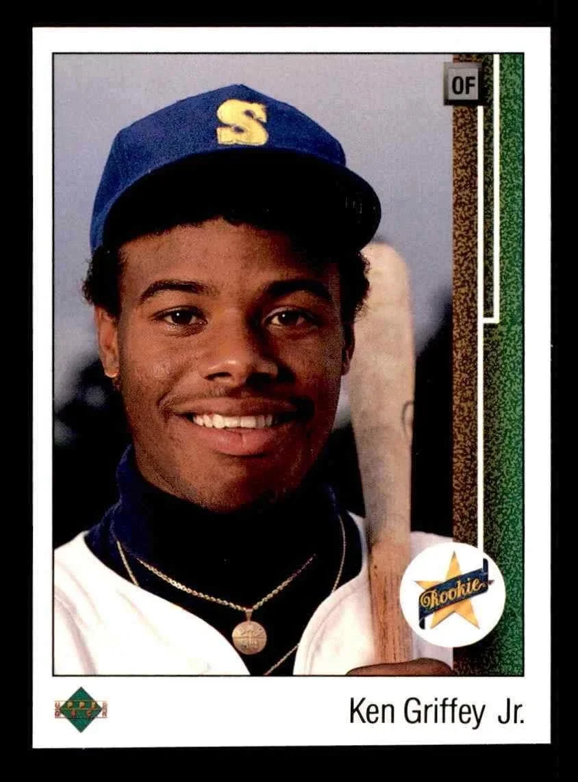 Upper Deck changed the hobby by introducing premium card design, better print quality, and the first widely distributed pack-inserted autographs, raising expectations for what a baseball card could be.