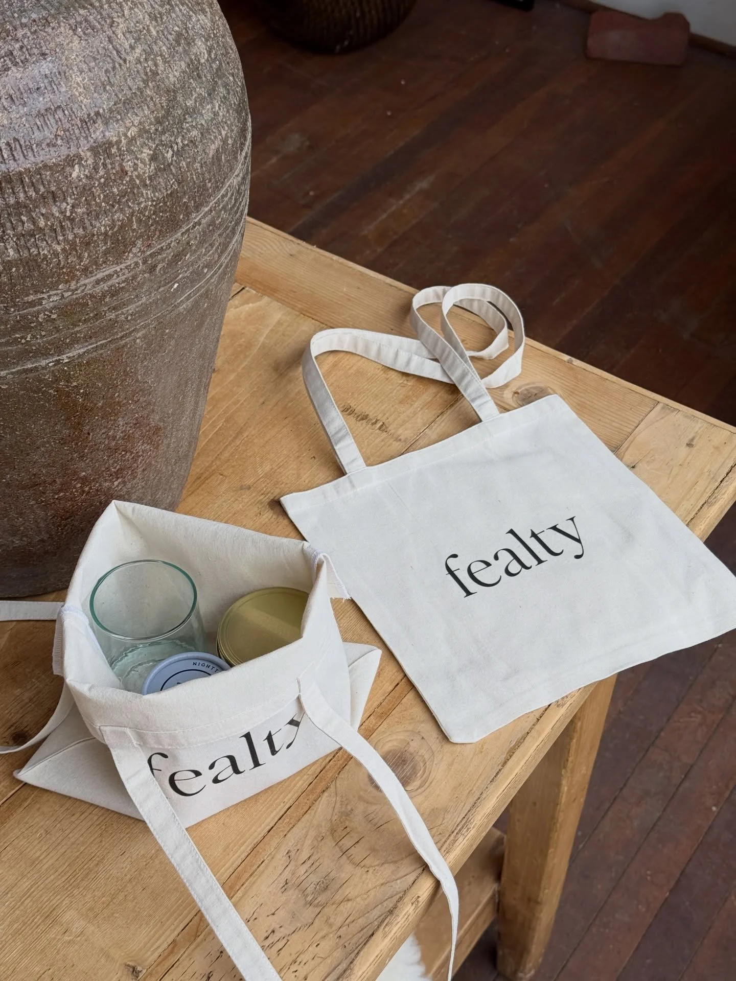 Getting the shop ready for our 1 Year celebration next Saturday! Fresh merch - mini Fealty totes making their debut for the event ✨ plus lots of new items, cute spring apparel, a flower bar, spritzes, and a free gift with purchase (will showcase late