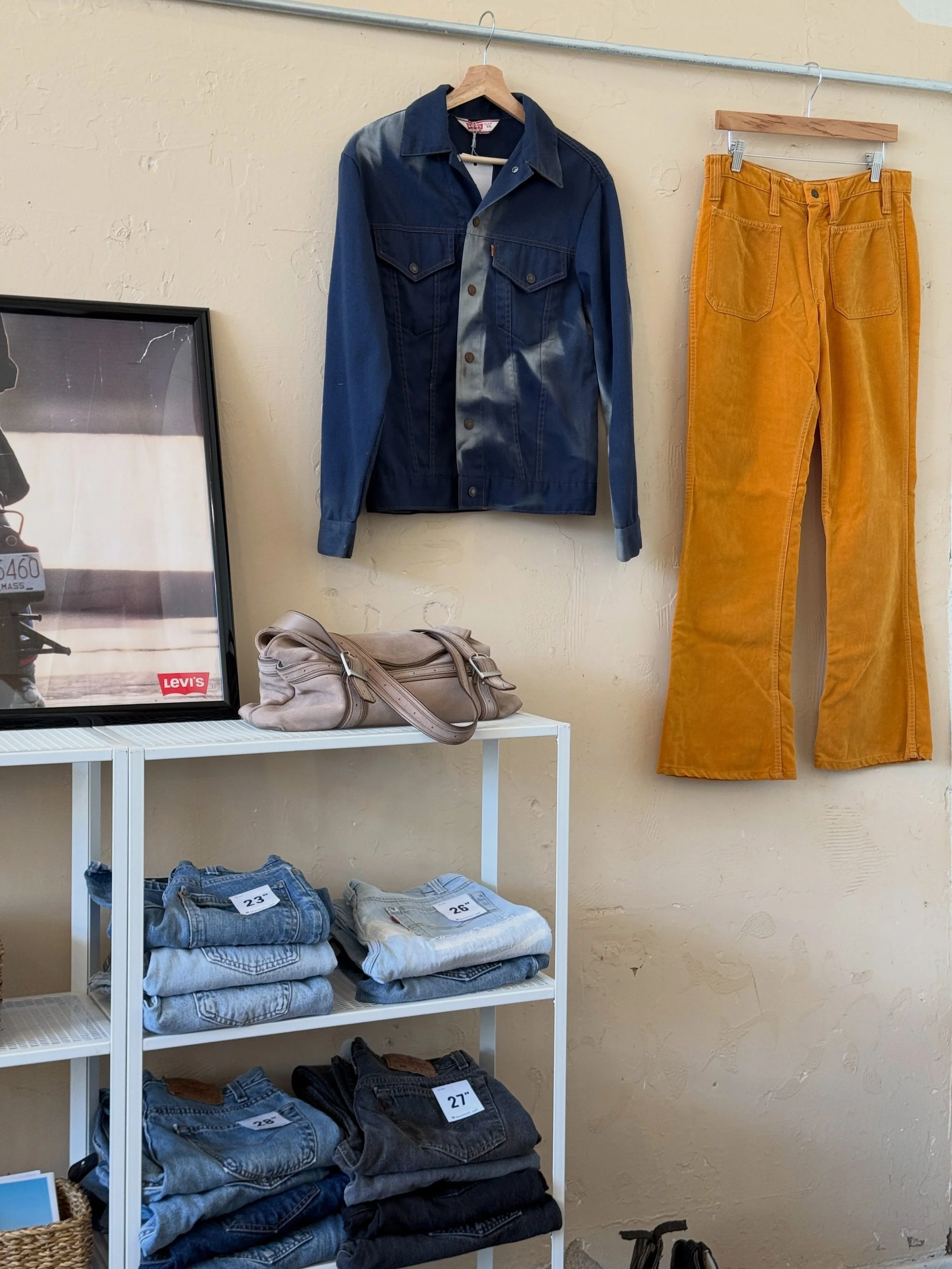 This shop corner👖 lots of vintage in the shop right now and I&rsquo;m loving it 💫 especially the rack that features 70s-90s statement denim pieces