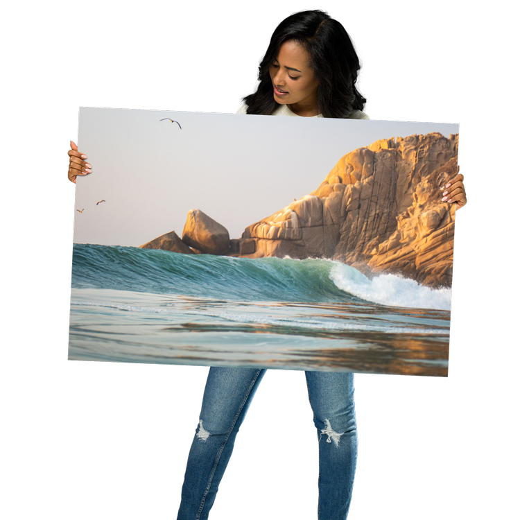 Captured from the lineup at Barra de la Cruz, this golden-hour scene frames a clean peeling wave beneath the region’s iconic granite cliffs.