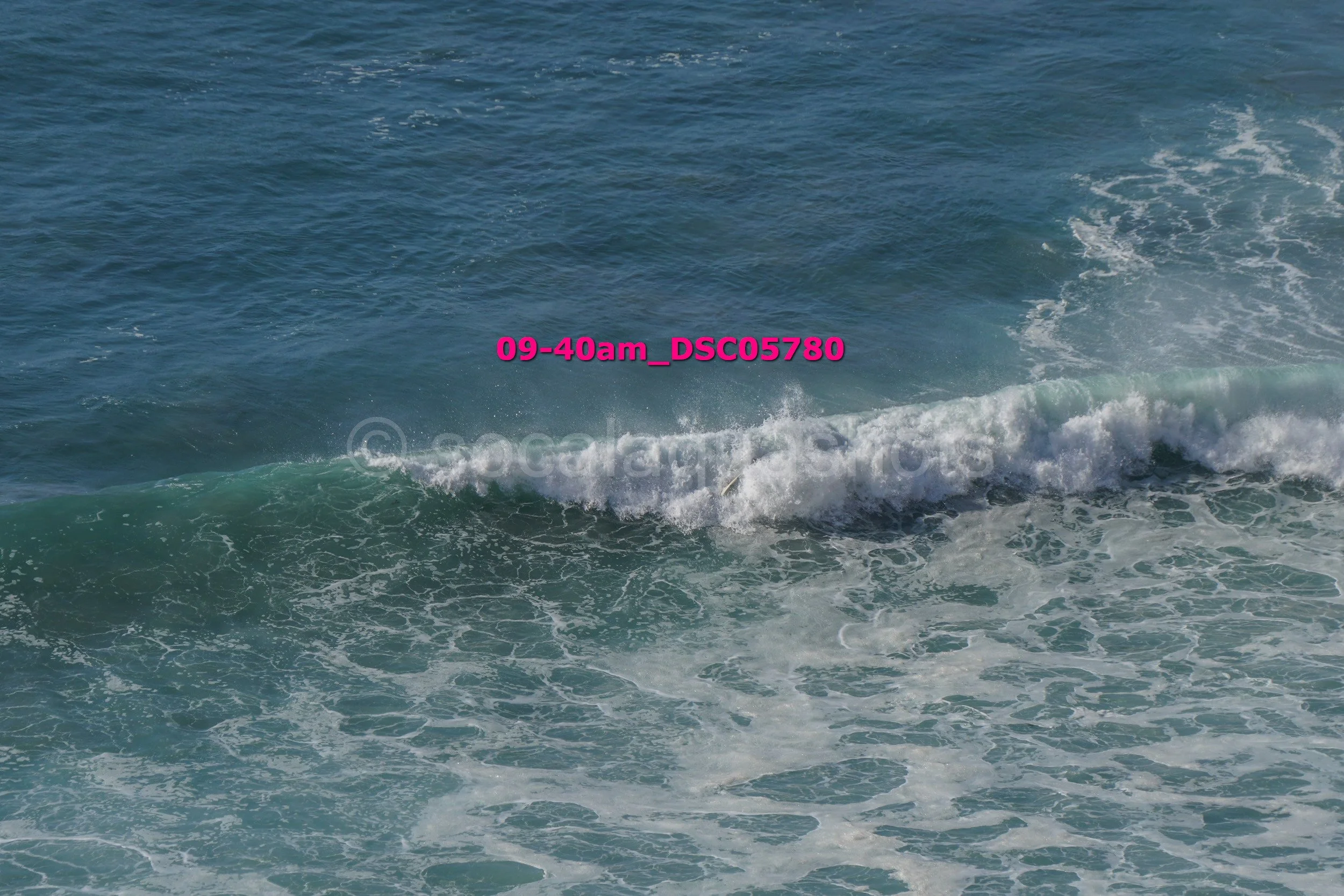 Ocean waves with a splash, shot at 9:40 am.