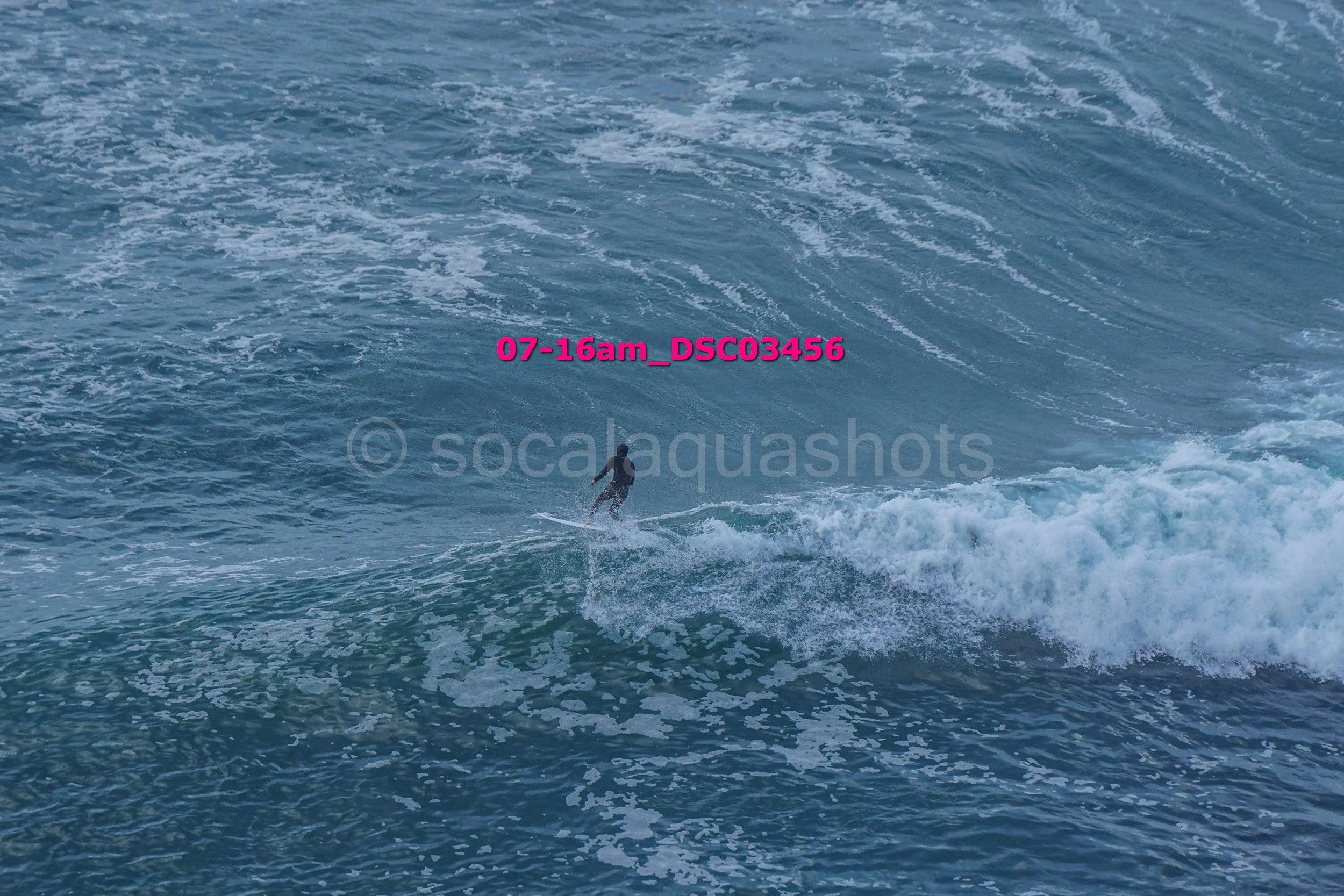 A person surfing on the ocean waves.