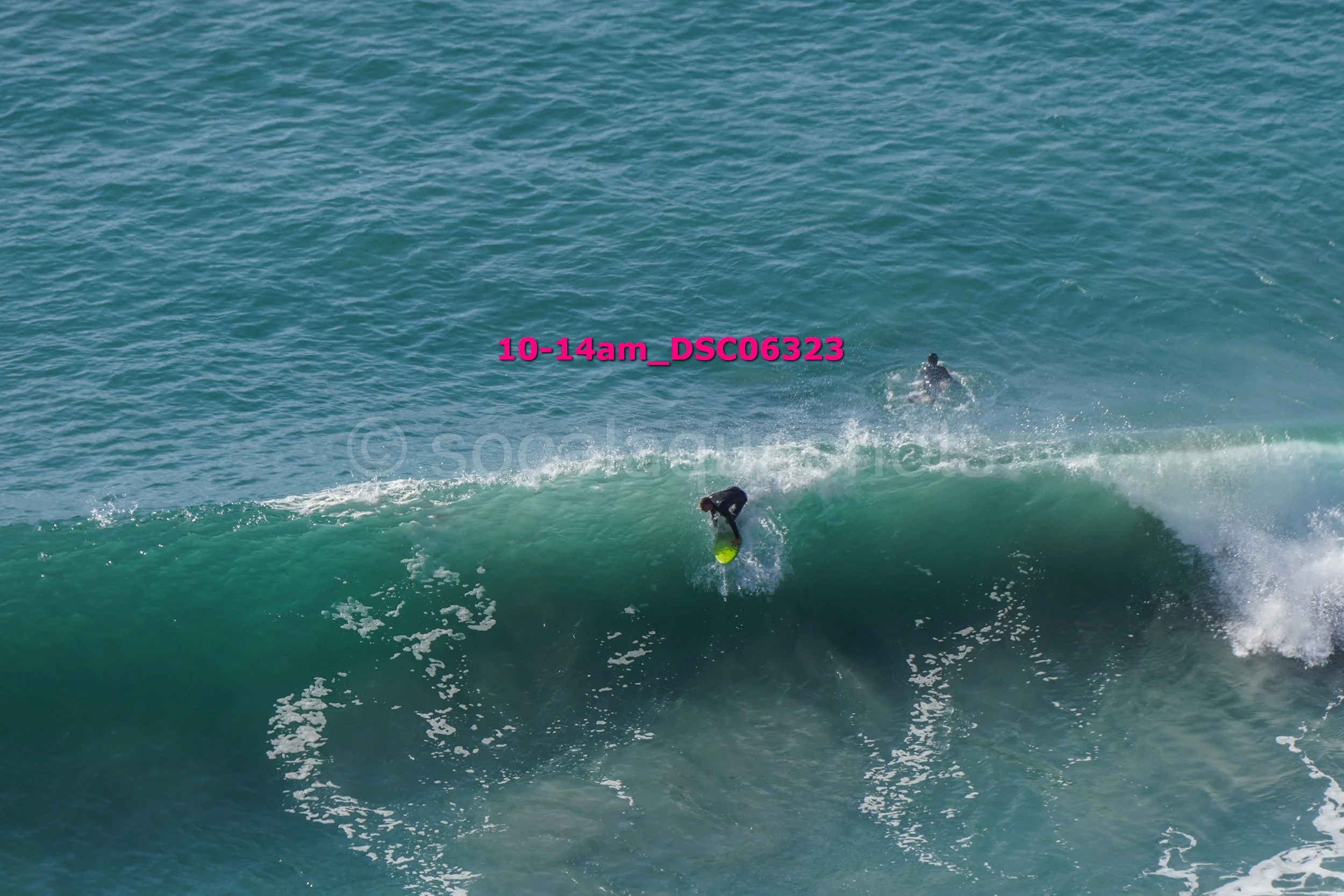 Surfer riding a wave in the ocean