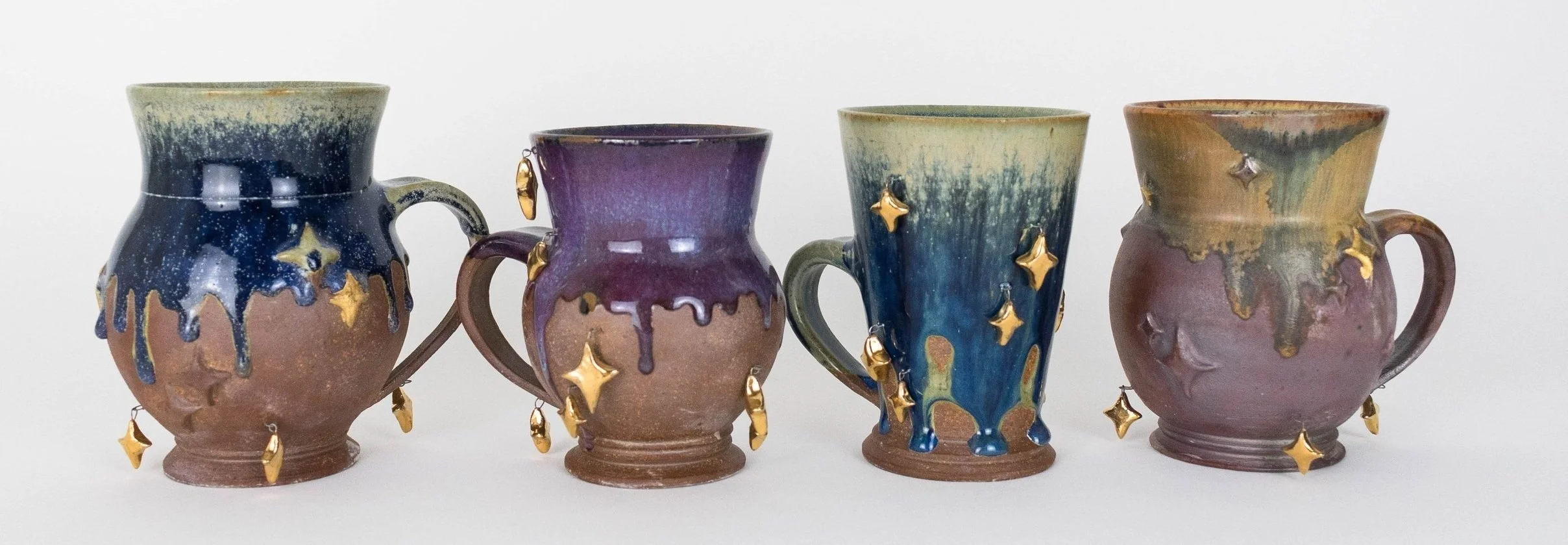 Charm Mugs
Stoneware, Soda Fired, nichrome wire, 22k gold luster,
2024