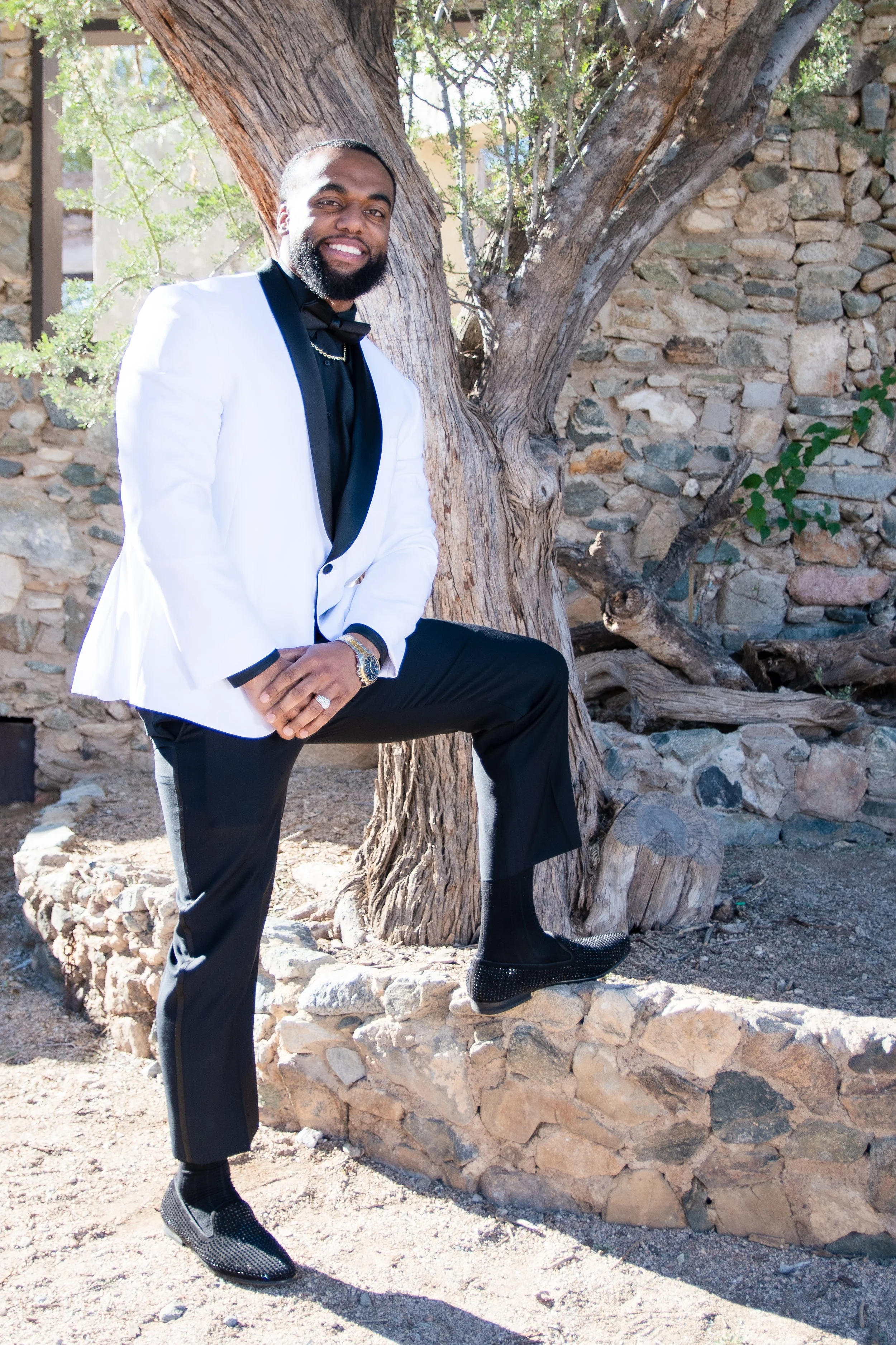 Groomwinwhitesuit.jpg