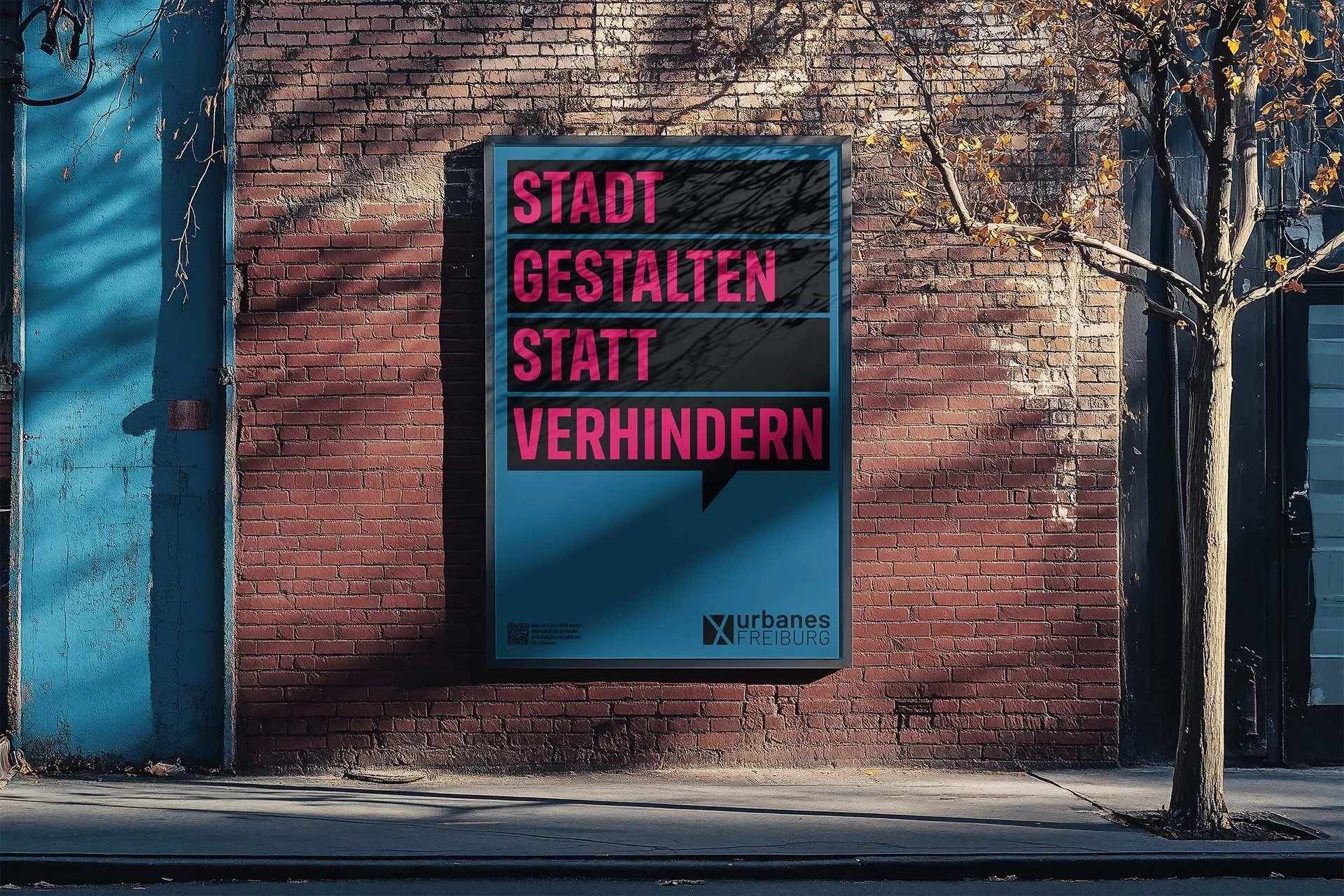 Urbanes_Freiburg_Vertical Billboard on th Brick Wall Mockup.jpg