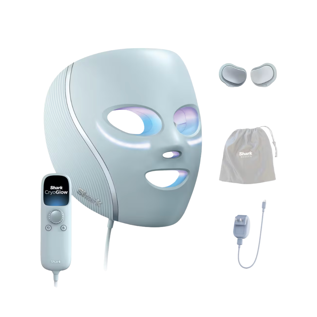 A light blue Shark CryoGlow LED face mask shown with its handheld remote, eye shields, and travel pouch.