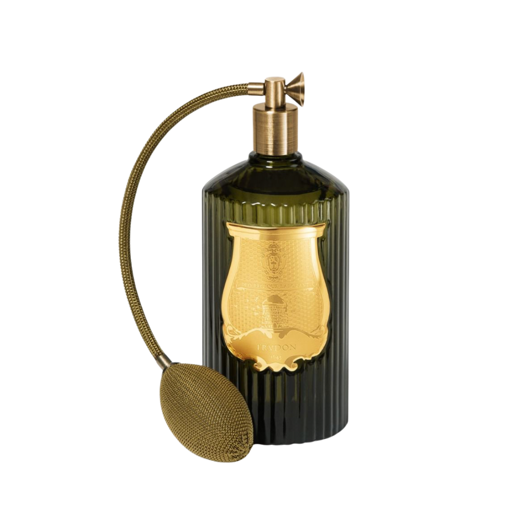 Trudon Cyrnos luxury room spray in fluted dark green glass bottle with gold crest label and vintage atomizer pump bulb