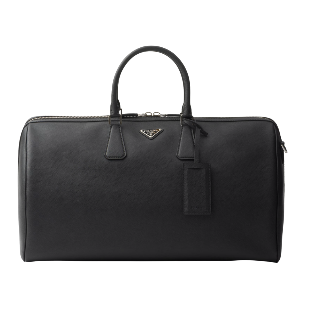 A black Prada Saffiano leather duffel travel bag with top handles and the iconic silver triangular logo.