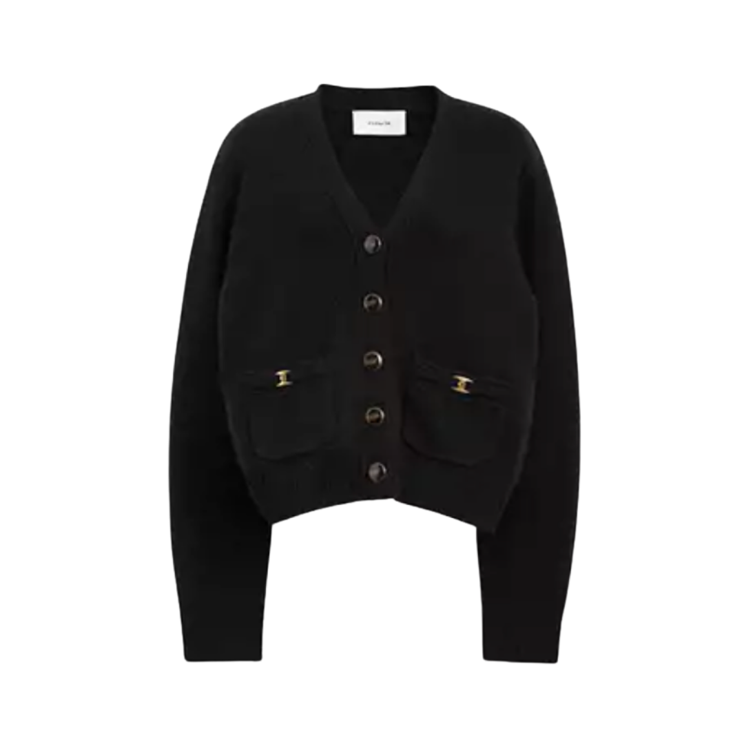 A cropped black button-up cardigan with gold hardware detailing on the front pockets.