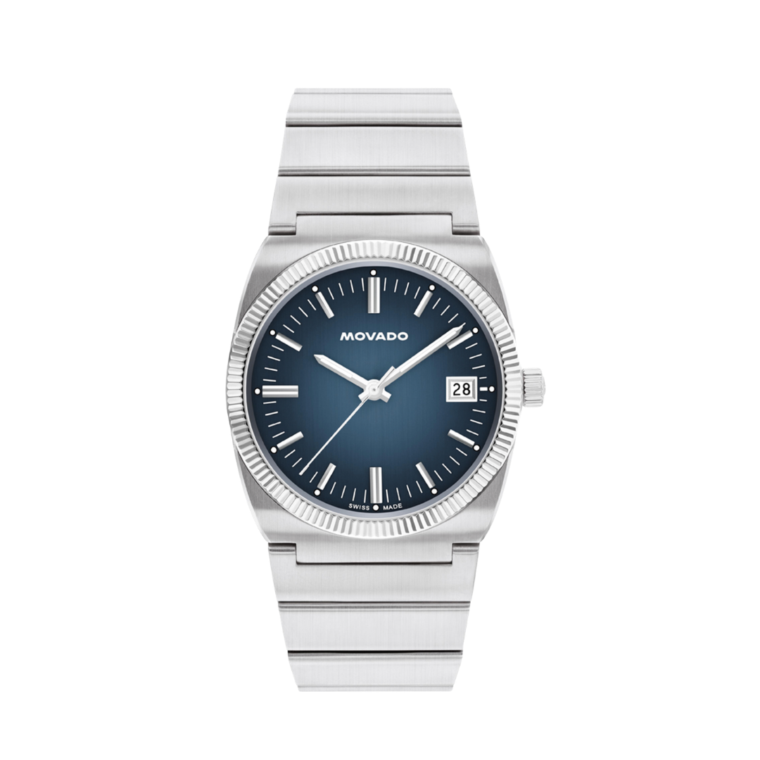 A Movado Heritage watch with a stainless steel link bracelet and a deep navy blue dial featuring a date window.