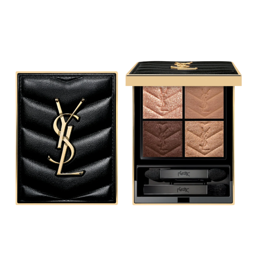 An open YSL eyeshadow palette with four shimmering nude and bronze shades, featuring a black quilted leather exterior with a gold YSL logo.