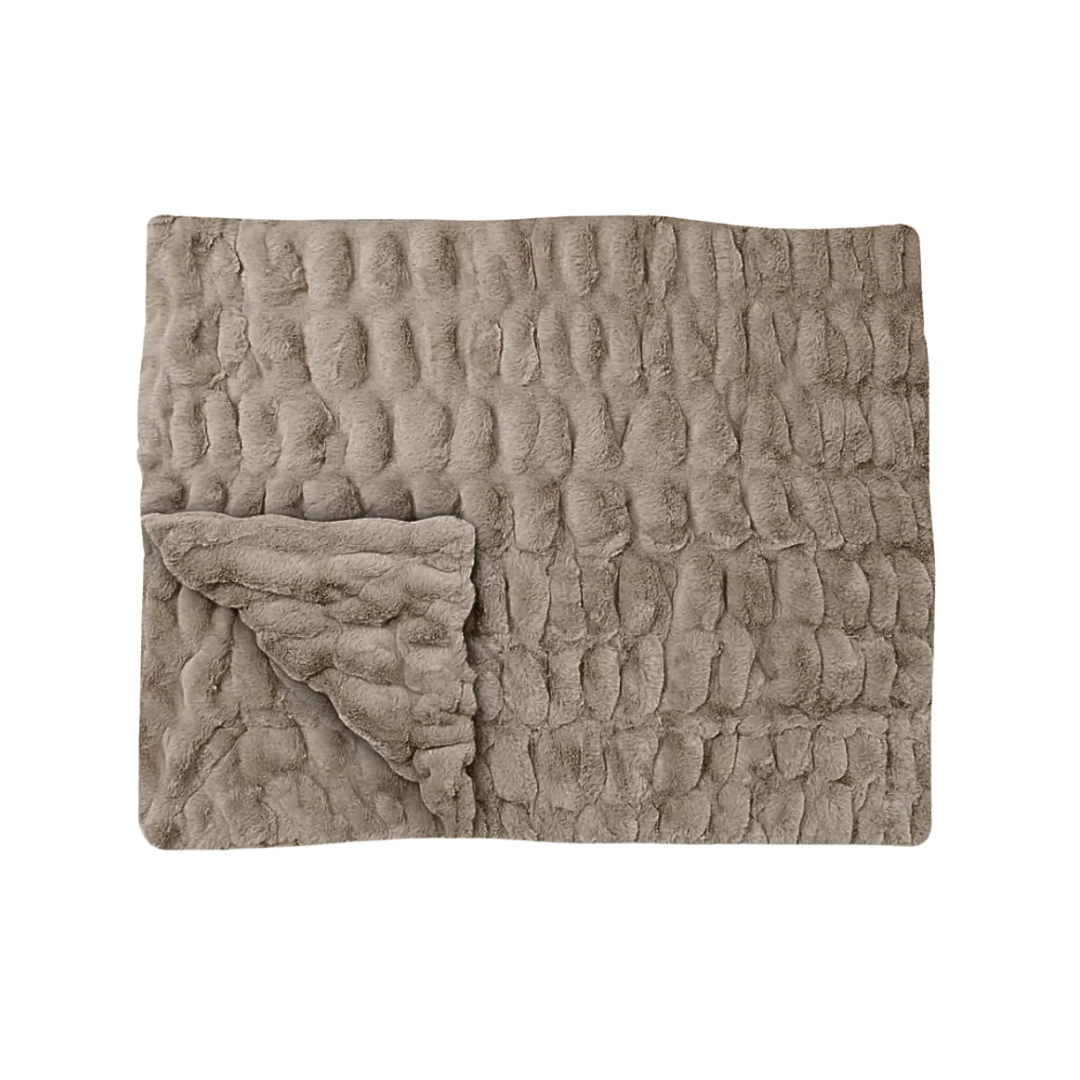 A thick, textured faux-fur throw blanket in a warm taupe 'Desert Dune' color, folded to show its plush underside.