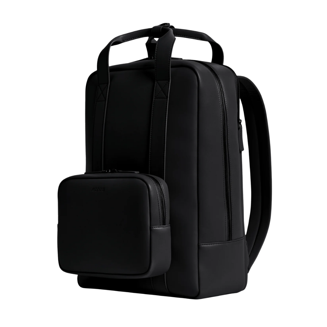 A structured matte black Metro backpack with a matching detachable front utility pouch.