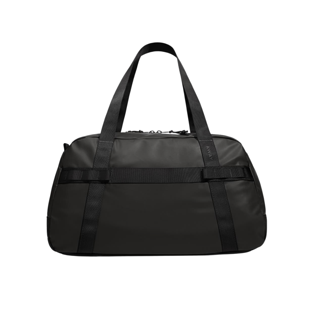 A structured matte black water-resistant duffle bag with tonal black straps and a minimalist design.