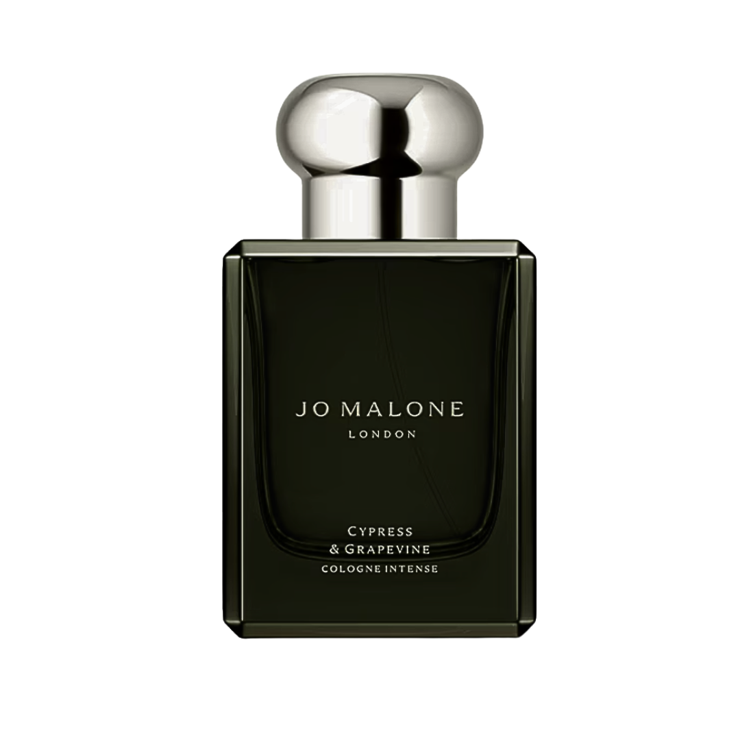 A dark, forest-green Jo Malone glass bottle with a polished silver cap and minimalist black label.