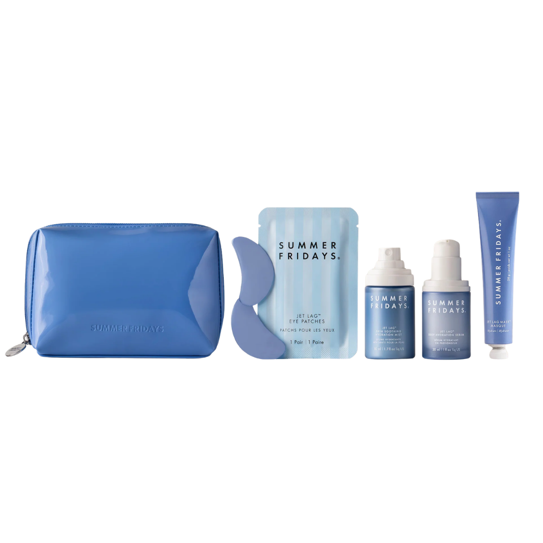 A Summer Fridays skincare set featuring the Jet Lag Mask in a blue tube, matching blue travel pouch, and various serums.