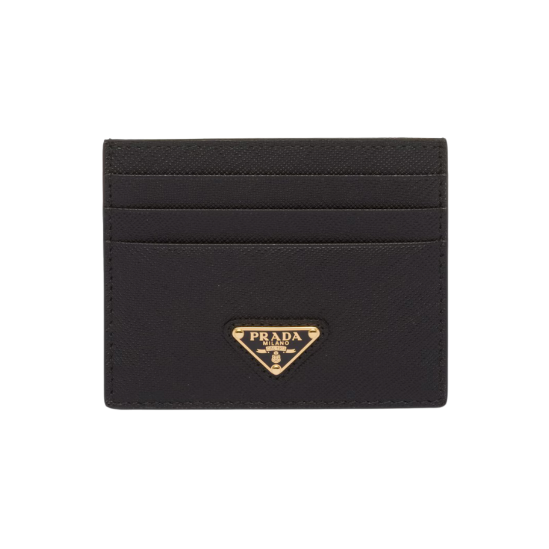 A black Prada Saffiano leather card case with the iconic silver and black triangular logo.