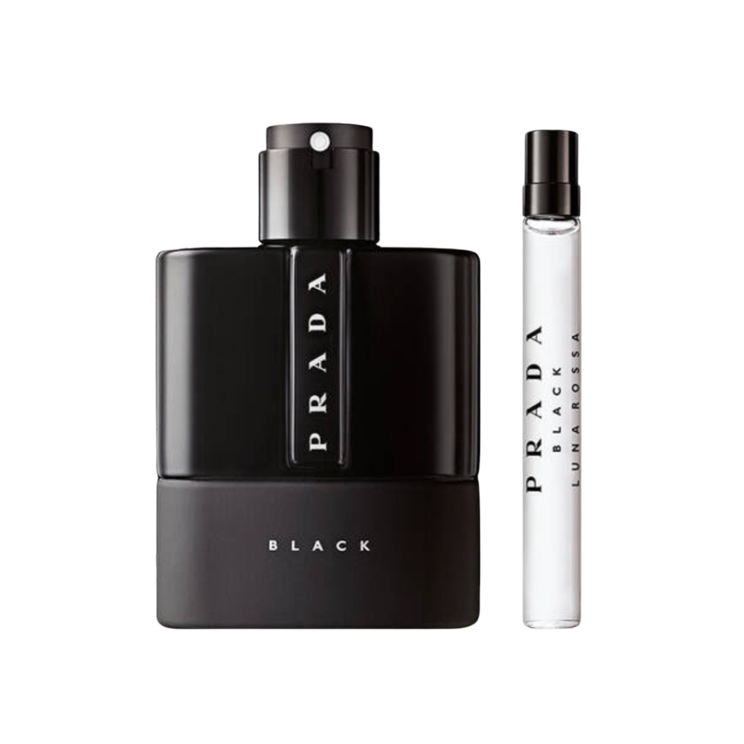A Prada Luna Rossa Black set including a matte black opaque cologne bottle and a slim clear glass travel vial.
